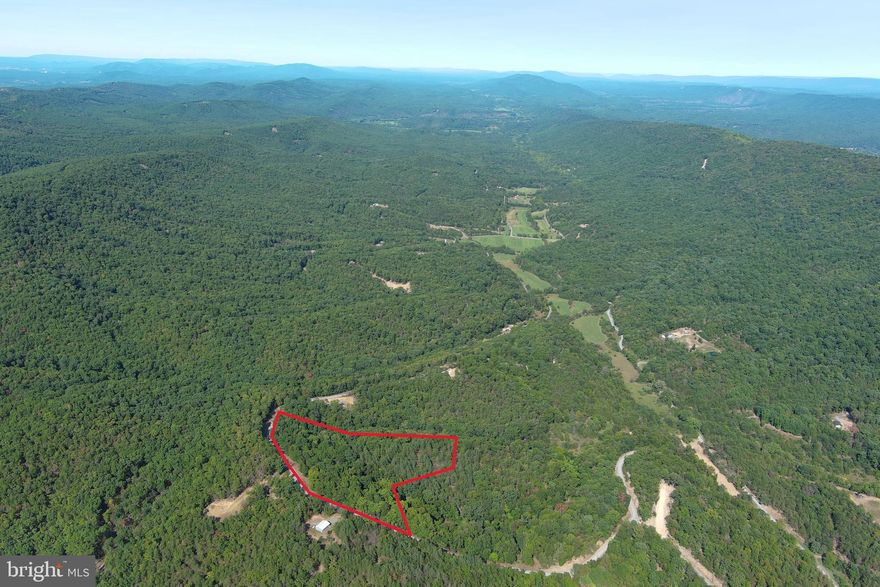 FEATURES & BENEFITS......8 WOODED ACRES WITH LOTS OF COOL FEATURES AND BENEFITS GALORE.....DRIVEWAY ROUGHED IN TO BUILD/CAMP SITE OFFERING BIG VIEWS OF ROMNEY MOUNTAIN, SO YOU'RE ALREADY AHEAD ON INFRASTRUCTURE COSTS....NICE TOPO WITH SKINNY RIDGE AND WIDE SHALLOW HOLLOW....SETS UP NICE FOR ATV'S AND SHOOTING.....LOADED WITH DEER....POWER & PERKED..... LOCATED IN THE WELL MAINTAINED QUIET GATED COMMUNITY OF HAMILTON ESTATES....GET THAT WAY OUT THERE FEELING WITHOUT ACTUALLY BEING WAY OUT THERE.....ONLY 1/2 MILE OFF THE PAVED ROAD AND LESS THAN 10 MINUTES FROM ROMNEY, PUBLIC ACCESS ON THE SOUTH BRANCH OF THE POTOMAC RIVER AND FORT MILL RIDGE(500 acres of public hunting) NICE.......NICE LOT, NICE LOCATION, NICE PRICE! THIS PROPERTY CHECKS A LOT OF BOXES AND WOULD SUIT FOR MANY APPLICATIONS....HUNT, SHOOT, ATV'S, CAMP OR BUILD. I DARE YOU TO FIND MORE BANG FOR YOUR BUCK UNDER 50K!