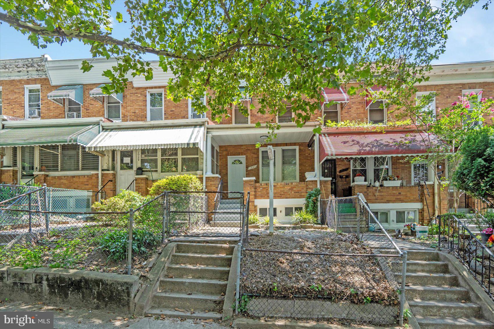 Beautifully renovated 5BR/2BA brick Townhome located on a tree-lined street in Milton-Montford. Make your way to the covered front porch and open the door into your new home. Step inside to an open concept main floor with tons of natural light, recessed lighting, a soft color palette and luxury flooring throughout. The main floor offers a spacious living room open to the dining room and brand new kitchen. The kitchen offers plenty of cabinets, stainless steel appliances, granite countertops with a subway tiled backsplash, and an island with pendant lighting and breakfast seating. On the second floor are two sizable secondary bedrooms, a spacious primary bedroom, and a full bath. The lower level is finished offering additional living space including the last two bedrooms, a full bath with a walk-in shower, laundry, storage, and a walk-out to a fenced yard. From the main floor step outside to a yard filled with tons of possibilities. This home is move-in ready with so much to offer any new homeowner and is located in close proximity to shopping, restaurants, and commuter routes.