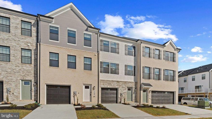 New Home in the PERFECT LOCATION! Surrounded by guest parking, this townhome features 3 bedrooms, 3.5 baths, a lower level den (that can double as a 4th bedroom) and INCLUDES a 12' x 10' DECK off of the kitchen. Thoughtful design is uniquely embodied in this townhome plan, which features 1,969 sq ft of living space. This home offers a spacious rear main level eat-in kitchen with upgraded gray cabinets, quartz countertops and stainless-steel Whirlpool appliances. Recessed lighting and blinds are provided throughout the home as well.  Hard surface flooring throughout the entire home offer modern luxury and contemporary appeal. The third level features a luxurious primary suite with a large walk-in closet and a spacious double vanity primary bathroom.  Two secondary bedrooms, upper level laundry, and hall bathroom which also includes upgraded gray cabinets and a quartz countertop. There is plenty of space for entertaining family and friends in your finished lower level den leading to your private backyard. Simplify your life with D.R. Horton's smart home technology which includes a keyless entry, Skybell (video doorbell), programmable thermostat to adjust your temperature from your smartphone and much more! With black windows and a black garage, the curb appeal of this home boasts an urban and modern feel that is sure to stand out.  Conveniently located across the street from tons of shopping and entertainment options. Closing incentive options available with the use of DHI Mortgage.  Quick access to Routes 301, 5, I-495 and the Washington DC area.