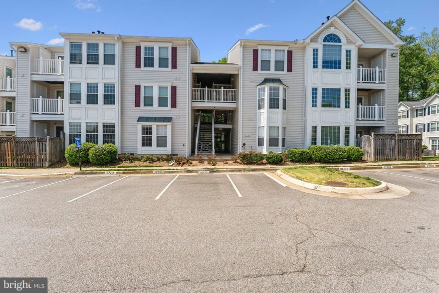 Discover the ideal blend of space, location, and livability in this well-maintained ground-floor condo in the sought-after Highland at Gunston Corner community. Tucked into the heart of Fairfax, VA, this inviting two-bedroom, two-bath residence offers a rare combination of practicality and comfort—perfect for busy professionals, first-time buyers, or anyone seeking easy access to daily amenities and commuter routes.

Step inside to find a surprisingly spacious layout that includes a formal dining area, a cozy living room with built-in shelving and a gas fireplace, and a sunroom that opens to a fully fenced, private patio —ideal for relaxing or entertaining outdoors. The kitchen is thoughtfully designed with ample cabinetry and a functional layout that flows seamlessly into the main living areas.

The primary suite is generously sized and offers a large walk-in closet, direct patio access, and a private en suite bath with custom tile work, granite countertops, and a double vanity. The second bedroom is perfect for guests, a home office, or roommate living and is served by a full hall bath and features its own walk-in closet with wood shelving. The unit also includes an in-unit washer and dryer, one assigned parking space, one guest parking tag,  and access to the community pool.

Located just minutes from I-95, 8 miles from Fort Belvoir, and 9 miles from the VRE, this home is a commuter’s dream. Daily errands are effortless with shopping, dining, and services close at hand. The pet-friendly community adds to the welcoming atmosphere, making this condo a smart, comfortable choice in a well-connected location.

Looking for a move-in ready home with a smart layout and unbeatable access? This Fairfax gem is well worth a closer look.