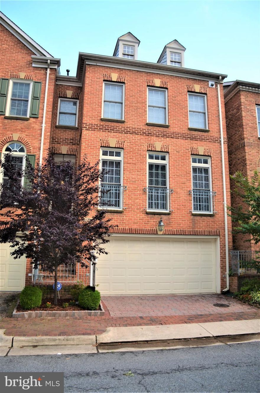 Fresh paint in the main level & Master bedroom & adding a shower in LL ! 2 car garage, 2 back decks, patio, 4 finished levels, 2 fireplaces, beautiful HW's on main & bedroom level, gourmet kitchen, backs to trees & walking trail.Enjoy Brenman Park, gym, pool, metro shuttle, farmers market, coffee shop & lake!Harris Teeter, CVS, & the library are just steps away!Make this beauty your next home!