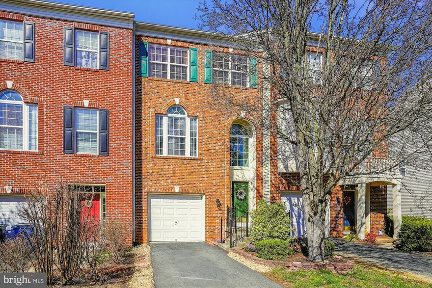Spectacular Brick Front Garage Townhome in Sought After Braemar*Premium Lot w/Deck & Privacy Fence Backs to Trees & Common Area*Boasts $30K+ in Recent Owner Improvements*New Luxury Vinyl Plank Flooring (2022)*Kitchen Renovation w/New Quartz Counters, Sink, Stainless Appliances, Backsplash & Painted Cabinetry (2021)*New HVAC (2020)*New Water Heater (2019)*New Sliding Glass Door to Deck (2023)*New Fence (2018)*New Washer/Dryer (2020)*Open Concept Main Level Floorplan w/Fireplace*Lower Level Rec Room w/Full Bath Routh-In Exits to Back Yard*Expansive Primary Bedroom w/Mountain Views & Luxury Bath*Braemar Boasts 2 Pools, Multiple Playgrounds, Pickleball, Tennis, Basketball Courts, Walking Trails & Streams*HOA Fee Includes Basic Cable & Highspeed Internet*Interactive Floor Plan Available By Clicking Virtual Tour Link