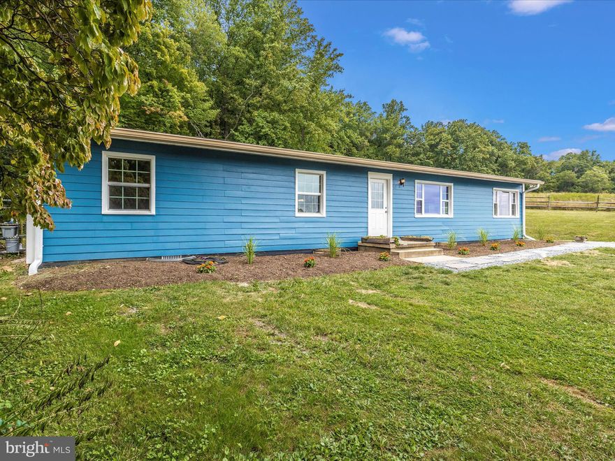 This charming rancher is in a perfect location. Nestled on over half an acre just outside of town. Providing privacy while being close to all the amenities Thurmont offers. Enjoy single-level living in this open-concept home featuring three bedrooms and two full bathrooms, including a sizeable primary bedroom with an en suite bath, hardwood flooring throughout, and recently remodeled—outside features gorgeous views and plenty of yard space.  If you're a hobbyist, you will love the large pole building, ample parking, paved driveway, and more.  Close to commuter routes. Schedule your tour today!