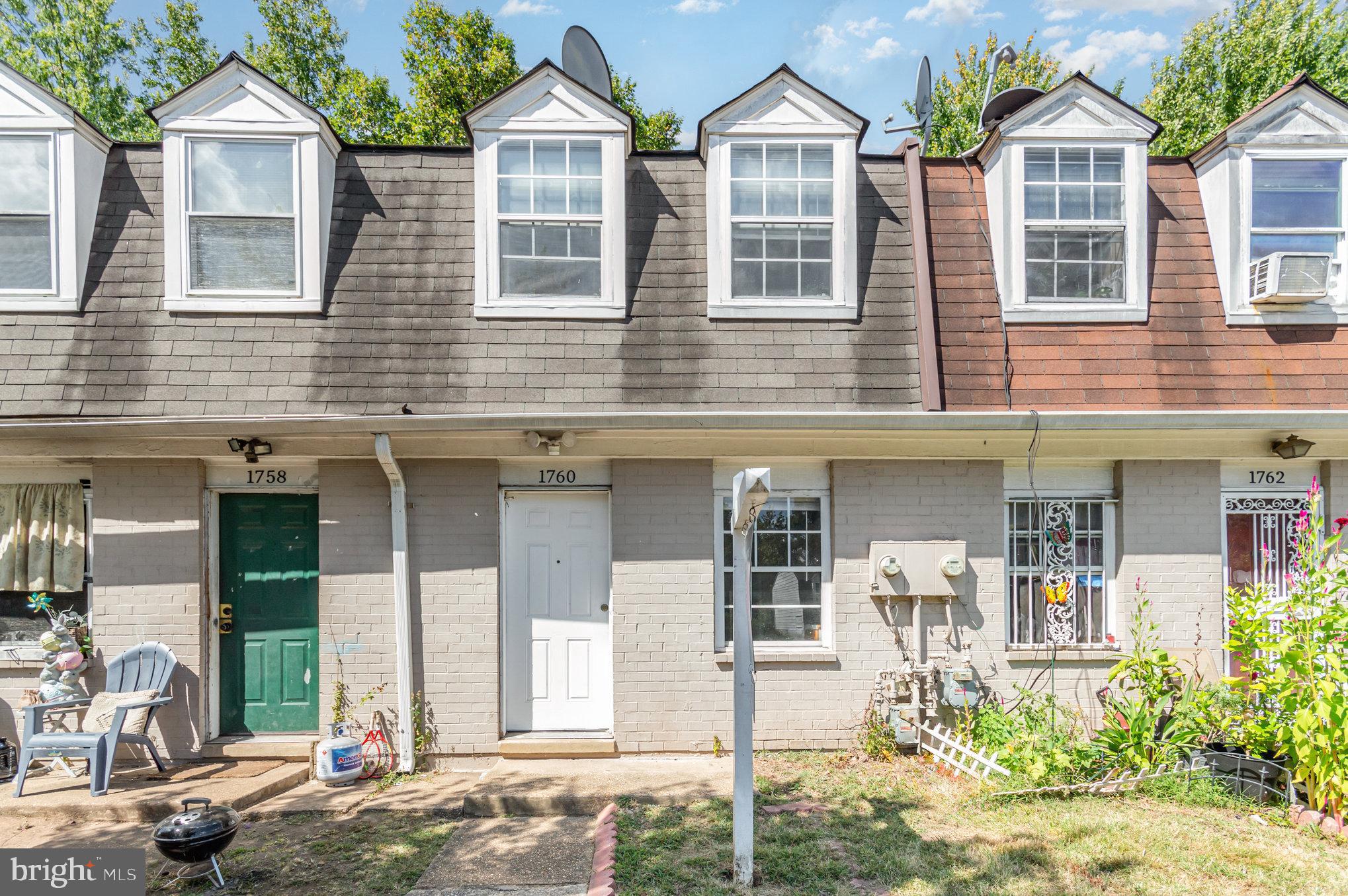 Fantastic opportunity!! This 2 level home features 2 bedrooms, 1 full bath, has its own washer and dryer in the unit and outdoor patio area backing to trees. No carpet! Floors have recently been replaced throughout. Appliances in great condition. Move in ready. Sits up on a hill overlooking the street. Lots of street parking available. Grass cutting and trash pick up is covered in the condo fee. Dont miss your opportunity to purchase this great home!!