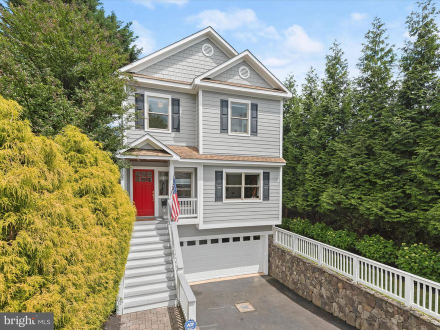 *Newly Listed & Open Sat 1-3pm* . Step into 2367 N Edgewood St, a Modern Coastal Craftsman  blending timeless elements with contemporary comforts, setting the stage for cherished family moments or a relaxing place to come home to. Crafted in 2004, this classic home spans over 4700 square feet across three levels, boasting 5 bedrooms and 4.5 baths.
On the main level, a gracious foyer welcomes you, leading to a front office, formal living and dining spaces, and a butler's pantry guiding the way to the gourmet kitchen with an inviting island, seamlessly flowing into the family room adorned with a cozy gas fireplace. Step outside onto the expansive deck, offering serene views of the lush, private and fully fenced rear yard—a perfect retreat for relaxation and entertainment.
Ascending to the second level, discover the luxurious primary suite featuring a tray ceiling, a generously sized walk-in closet, and a contemporary ensuite bath boasting double sinks, a glass shower, and a soothing soaking tub. Three additional bedrooms, two full baths, and a convenient laundry room complete this level.
The lower level unfolds into a haven of leisure, housing the fifth bedroom, a spacious rec room, and a gaming area complemented by a wet bar. A fourth full bath, utility/storage room, and a mudroom accessible from the two-car garage add to the functionality of this level. Throughout the home, hardwood floors, custom window treatments, and modern lighting accents compliments the classic style.
Conveniently situated in the coveted Woodmont Neighborhood, with swift access to DC via only one traffic light, and proximity to the GW Parkway, Georgetown, Tysons, and three airports, this residence epitomizes urban convenience. Zoned for a sought after school tier to include Taylor ES, Dorothy Hamm MS, and Yorktown HS. Take the path for a short walk or bike ride to Starbucks & Italian Store and less than a mile to Georgetown on the path. Located in Woodmont are two parks, YMCA Gymnastic Center and a beautiful walking trail in the Historic Fort C.F. Smith Park.