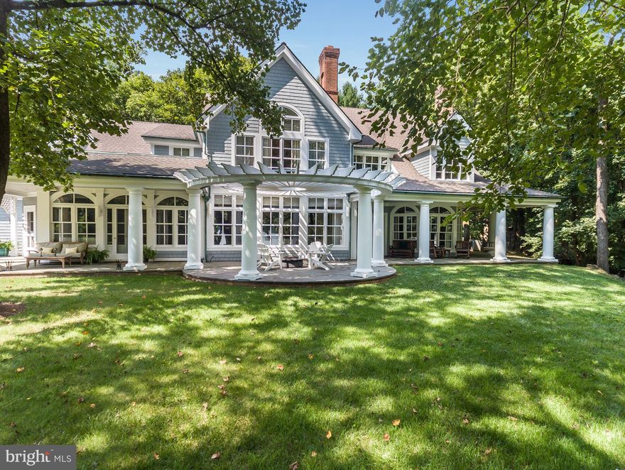 Private, Estate LIke Waterfront Home on the South River for luxurious living on 3+ acres.. Enjoy water views, private dockage, adorable guest/pool house, and chef's gourmet kitchen in this custom home. Stately property with exceptionally designed and constructed spaces; hardwood floors; French doors; hidden bar area, a sweeping staircase; exceptional outdoor porch, with fire pit, greenhouse.