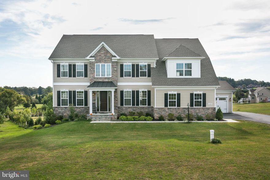 This Home Is Amazing! Stunning Colonial w/ 6000+ Finished Sq Ft of Beautiful Living Space! Spectacular Views.  Luxury Amenities Include: Tray Ceilings, Grand Staircase, Gourmet Kitchen, Wideplank Hardwood Flooring, Owner's Suite w/ Sitting Room, Luxurious Spa Bath.  Finished Lower Level w/ Wet Bar Hook-up, Full Bath.  3 Car Garage, 1.97 Acre Lot   Also for sale see HR10077754