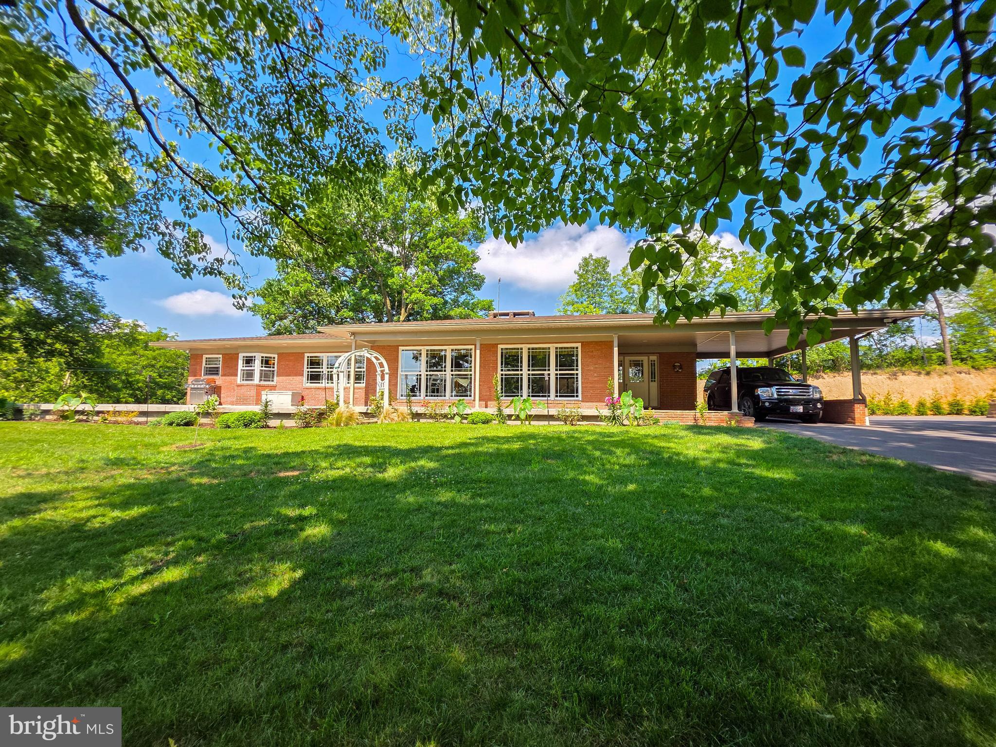 Private 8 acre Estate with Pond, Streams & Guest Suite Income – A Nature Lover's Dream! Escape to this exceptional, upgraded home nestled on a secluded property with two serene ponds (one stocked for fishing) and two gently flowing streams. Enjoy ultimate privacy and peaceful views from every angle.
Step inside to discover a beautifully renovated interior– Kitchen( with soft close doors/drawers and Quartz countertops), baths, electric, plumbing and HVAC all upgraded in 2021. New Roof and New windows 2021. Asphalt driveway installed 2023. Main level bedrooms, family room and dining area all boast gleaming hardwood floors. 3 large egress windows in lower level bedroom and full bath. Outdoor woodstove with season’s supply of stacked and seasoned wood included . House has 3 large bedrooms and 3 full baths, 2 fire places, Detached Garage apartment with 1 bedroom and one full bath, currently tenant occupied for $1,200 per month. City water hookup available. Sellers have planted over 300 trees of assorted varieties. Property is 2 separate lots, - the 2 acre lot has recent perc test. Amish Clothes line included with sale. Conveniently located about 3 Mile from Interstate 70*