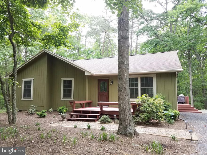 Beautifully updated, one-level home Located in Quiet area at Bryce Resort. With 3 BR/2BA & More Upgrades than can be mentioned this is an easy decision! Great Room has new floors, fresh paint, stone fireplace & NEW Kitchen w/ rustic open shelving. 2nd Family Room leads to private back deck as well as side deck down to Large Flagstone FirePit. Updated Master Bath with walk-in slate tile shower.