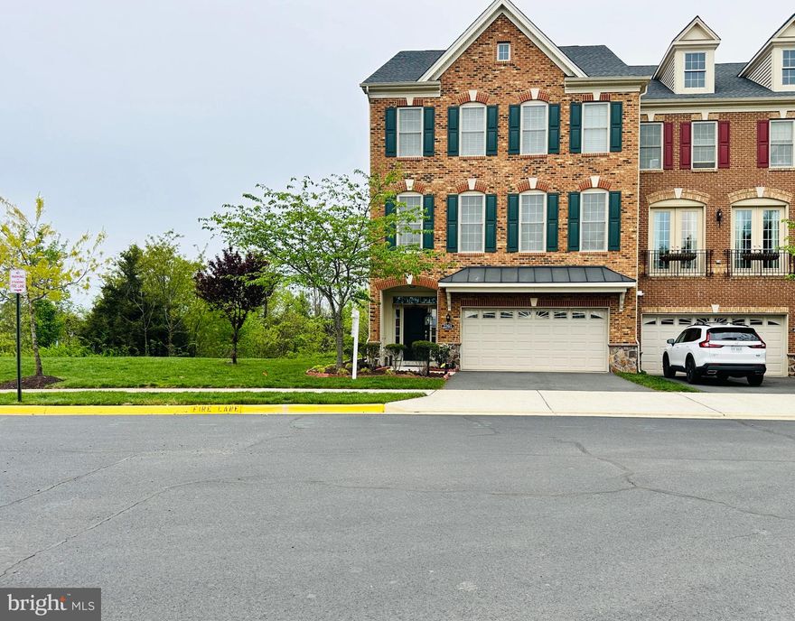This stunning end-unit townhome is located in the desirable community of Moorefield Green.  This home welcomes you into a spacious foyer leading to a large walk-out recreation room, full bathroom, and access to two car garage. This level is perfect for entertainment and setting up a home theatre (the theatre system does not convey). The main level features a spacious family room with a wood slat accent wall,  abundant natural light along with recessed lights. A modern gourmet kitchen that boasts abundant cabinet space, a gas cooktop, a backsplash, a chimney, a quartz countertop, SS appliances, a large island, and an expansive breakfast area to accommodate your guests.  The living room and adjoining dining room have a very cool accent wall feature and extra windows. The trex deck from the kitchen is perfect for your morning coffee. The open and modern layout makes living enjoyable. Immaculate hardwood flooring throughout the main level.  The half bath completes the main level.  The upper level features a large Primary suite with two walk-in closets. The en-suite bathroom features two separate vanities and a standing glass shower. The two secondary bedrooms are both sizable with access to a full bathroom from each bedroom (Jack and Jill). A laundry room completes the upper level. This home has it all. Pets case-by-case basis, with pet deposit, and pet rent. Note that we do not use the Zillow application, use the Rentspree link from the MLS. Home available from June 1st for occupancy, however, the landlord would be open to July 1st move-in too. 

Enjoy the incredible convenience of this Ashburn Location which offers a variety of Traveling Options. Minutes to the Ashburn metro, Dulles International Airport, and Popular Commuting Routes: Dulles Greenway, Dulles Toll Rd, Routes 50, 28, 15, and 7.

Proximity to the Shops at Moorefield Village Or a Quick Drive to Broadlands Market Place, Loudoun Station, Brambleton Town Center, One Loudoun, Reston Town Center, Town of Leesburg, Tysons Corner and So much MORE!!!