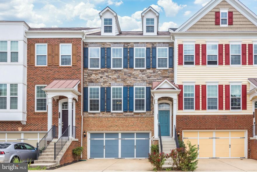 Spacious extended 4-bedroom, garage townhome. Call lister for details.  Features high ceilings, open concept main floor, over-sized deck, great location, family community with pool.