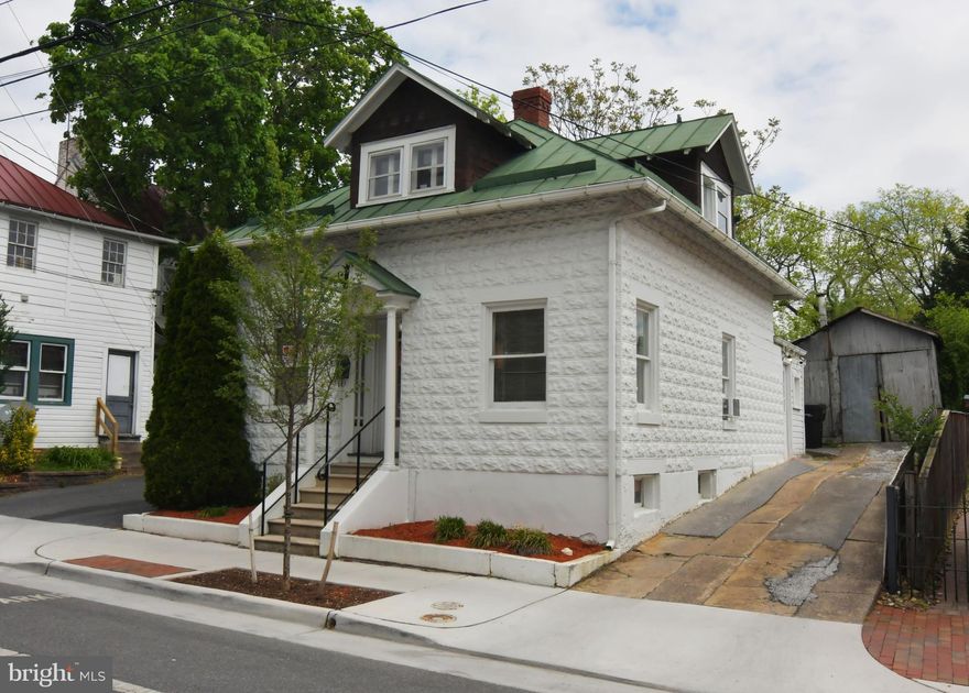 IDEAL LOCATION AT AN AFFORDABLE PRICE!  OFFICE OR RETAIL SPACE. CONVENIENT TO THE COURTHOUSE, GOVERNMENT OFFICES AND DOWNTOWN.  ACROSS THE STREET FROM A CITY PARKING GARAGE. Great space for attorneys, title companies, other business and professional offices, or retail.  The Frederick-Winchester Joint Judicial Center, Frederick County office building and City Hall are just down the street.   Approximately 1,100 square feet. Plus land in the rear for a possible addition. The main level consists of a 13x20 lobby, 11x10 main office, 11x10 conference room, a 14x9 break room with kitchen area and a half bath. Upstairs has two more offices, each 15x9, plus a full bath and storage closet. Square footage estimated. Room sizes are approximate. Fuel oil to be prorated at settlement. Security system remains but new owner would need to obtain own subscription. Cannot be used for residential. This property also is for rent at $1350 per month, see VAWI2005470.