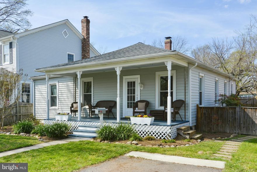 Charming single family at a townhouse price! Character abounds!  3 BR, hardwood floors, higher ceilings, open floor plan. Roof, hot water heater newer, freshly painted throughout, lovely front porch and back yard with two storage sheds. Laundry/mud room opens to patio and fully fenced yard. Easy walk to Historic Herndon