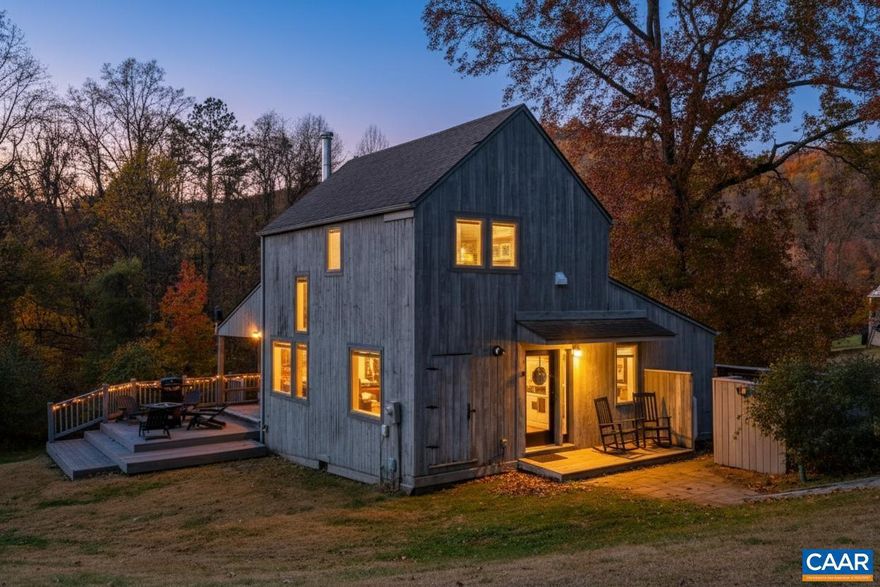 Nestled in the heart of Nellysford along the beloved Nelson 151 Trail, this enchanting farmhouse?styled after Virginia?s historic tobacco barns?combines rustic charm with modern amenities. It boasts an open floor plan that flows beneath soaring cathedral ceilings, exposed wooden beams, & rich wood ceilings, creating a warm, lodge-like atmosphere. A wood stove invites cozy gatherings on cool mountain evenings. The home offers 3 bedrooms and 2 full baths, providing comfort and flexibility for family, guests, or short-term renters. Step outside to the expansive deck, and enjoy pastoral and mountain views -perfect for morning coffee, al fresco dining, or simply soaking in the serenity. Just a short ?hop? away, residents enjoy access to the community pool & tennis/pickleball court, ideal for staying active or cooling off on warm Virginia days. Already a proven short-term rental favorite, this property delivers income potential while serving beautifully as a full-time residence or weekend retreat. Located on the Nelson 151 Trail?home to wineries, breweries, and cideries?it?s an unbeatable opportunity to own a piece of Virginia?s Blue Ridge charm. Timeless appeal, modern amenities, and an idyllic setting await!,Granite Counter,White Cabinets,Wood Cabinets,Fireplace in Living Room