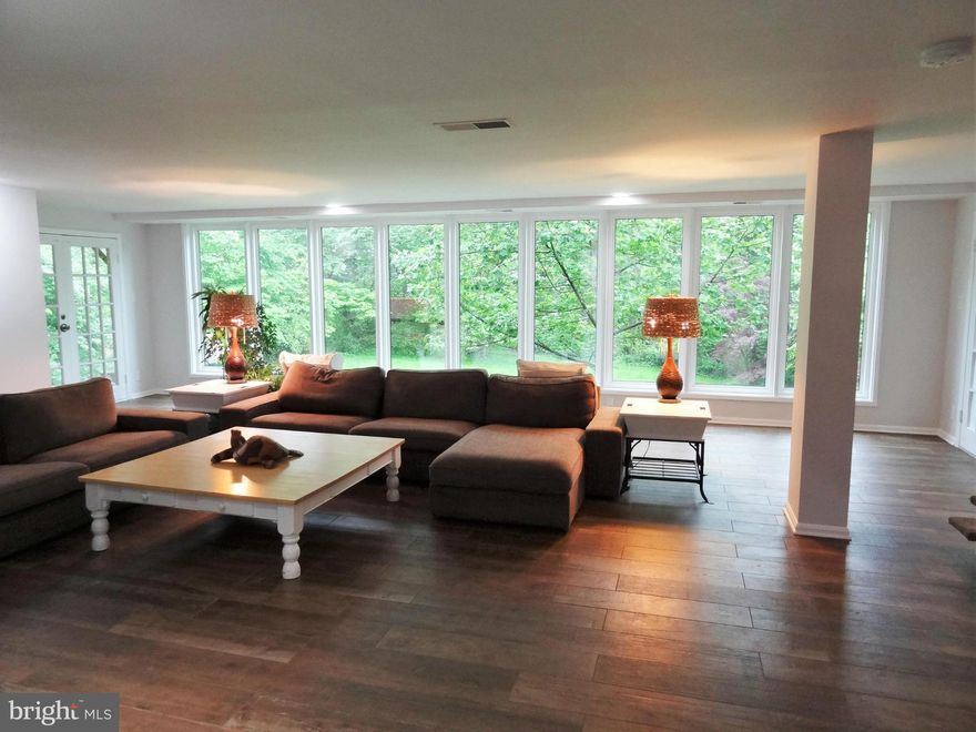 Beautiful home, WINDOWS Galore. Light Filled 3325 SqFt Total. 4BR, 3BA 2-Story Rambler. Spectacular Home Inside the Beltway. New Paint, New Porcelain Wood Flooring throughout! New Roof, Driveway & Deck. UNBELIEVABLE GREAT ROOM says ENTERTAIN! Easy to Rt 50, Columbia Pike, 395 and close drive to East Falls Church Metro. Updated Kitchen and Baths. Large secluded back yard with mature landscape.