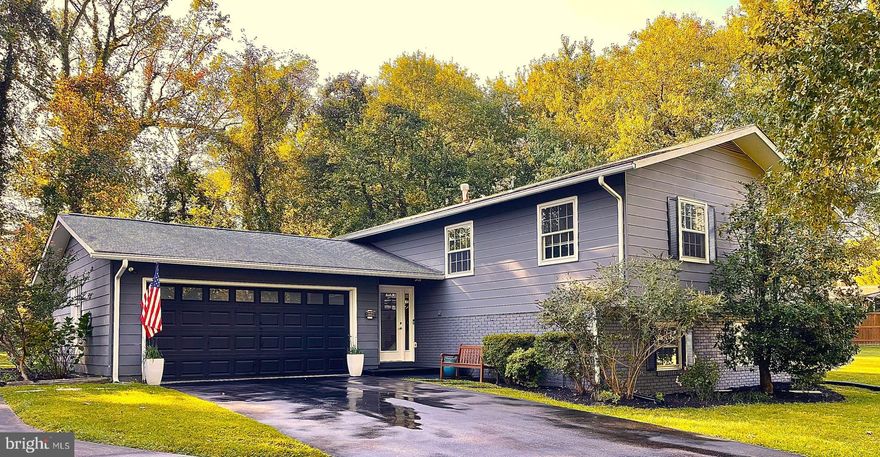 Welcome to this beautifully updated home, in sought-after, water privileged Wilelinor.  The home has been lovingly renovated and completely updated by the current owner and newly painted throughout.  The main level features a main-level primary suite with a gorgeous, renovated ensuite bath, and fabulous custom walk-in closet, a second bedroom; an updated kitchen with a large custom-built island, a large family room, custom handcrafted handrails, a spacious dining area overlooking a huge deck with custom deck rails and a huge, gorgeous, private, and partially fenced yard.  The lower level offers a spacious second living area, a bedroom with an updated ensuite bath, and a large second living space that could be a bedroom, media, or workout room.  Wilelinor is a voluntary HOA offering a marina with boat slips available, a kayak launch, and a clubhouse.  Move right into this quiet, tree-lined community that is ideally located minutes from shopping, commuter routes, and the Annapolis historic district, and feeds into Blue Ribbon schools.  Home sweet home!