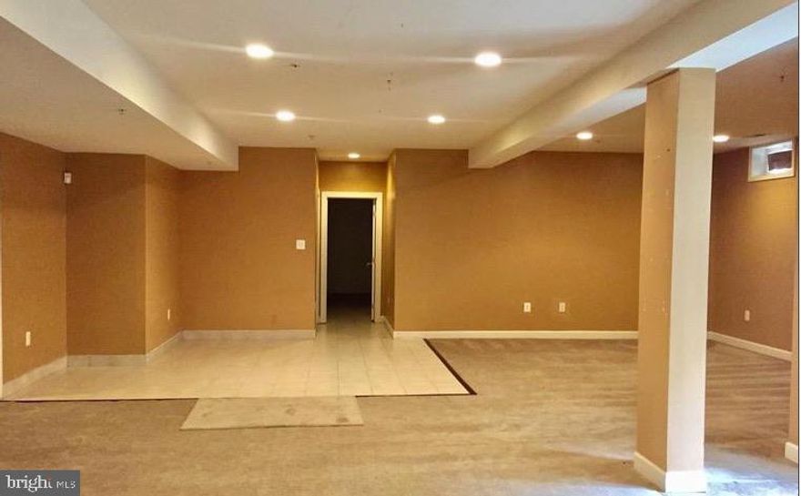 Utilities are included. Exceptionally great basement rental over 2000 square footage. Huge room with loads of closet space. Full kitchen. Very spacious open living room area, dining area and very open flow. Full bathroom. It's own entrance at the back of house and parking spots designated.