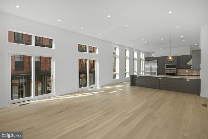 Incredible, EXTRA LARGE CORNER home at the elegant residential community of Black Horse Alley, located in the heart of Old City! Enter from the beautiful cobblestone walkway which leads to the quaint front stoop of this luxury townhome. This home radiates high end living! Step inside and explore more than 5,000 SF of curated living space which offers 5 bedrooms, 3 full and 3 powder baths, a 6 stop elevator,multiple outdoor spaces and an approved tax abatement! A 2 car, side by side garage with gated secured driveway in the rear the home provides modern convenience in one of the city s most historic settings. The expansive, open concept main level with its sweeping windows and gorgeous natural light provides space to entertain!  Enjoy premium amenities including a gourmet chef s kitchen with custom cabinetry, sleek quartz countertops, a Wolf and Sub-Zero appliance package, expansive bar with seating for 6. On the third floor you ll find three spacious bedrooms, two full baths and custom walk in closets, plus a full size laundry room with Whirlpool washer and dryer. The spacious master suite, located on the fourth floor, is a tranquil place to relax after a long day in the city. This sun drenched oasis offers a huge tailored walk in closet and spa inspired bath with double vanity, freestanding soaking tub and frameless glass shower with dual shower fixtures. An additional bedroom is also located on this level. The beautifully finished basement features a large bedroom, powder bath and media room - perfect for game days or movie nights! The private roof deck provides panoramic views of the city and the well-appointed pilot house, with its generously sized lounge area, powder room bath, makes outdoor entertaining a breeze!An abundance of windows provide amazing views from every floor of this corner home. Additional standard features include media room,hardwood floors throughout with large format porcelain tile on bathroom floors and showers, multi-zone energy efficient HVAC system, Honeywell alarm system and Control 4 smart home with touch screen and prewire package. All square footage numbers are approximate and include above and below grade measurements. Square footage should be verified by the buyer. It is the responsibility of the buyer to verify real estate taxes.