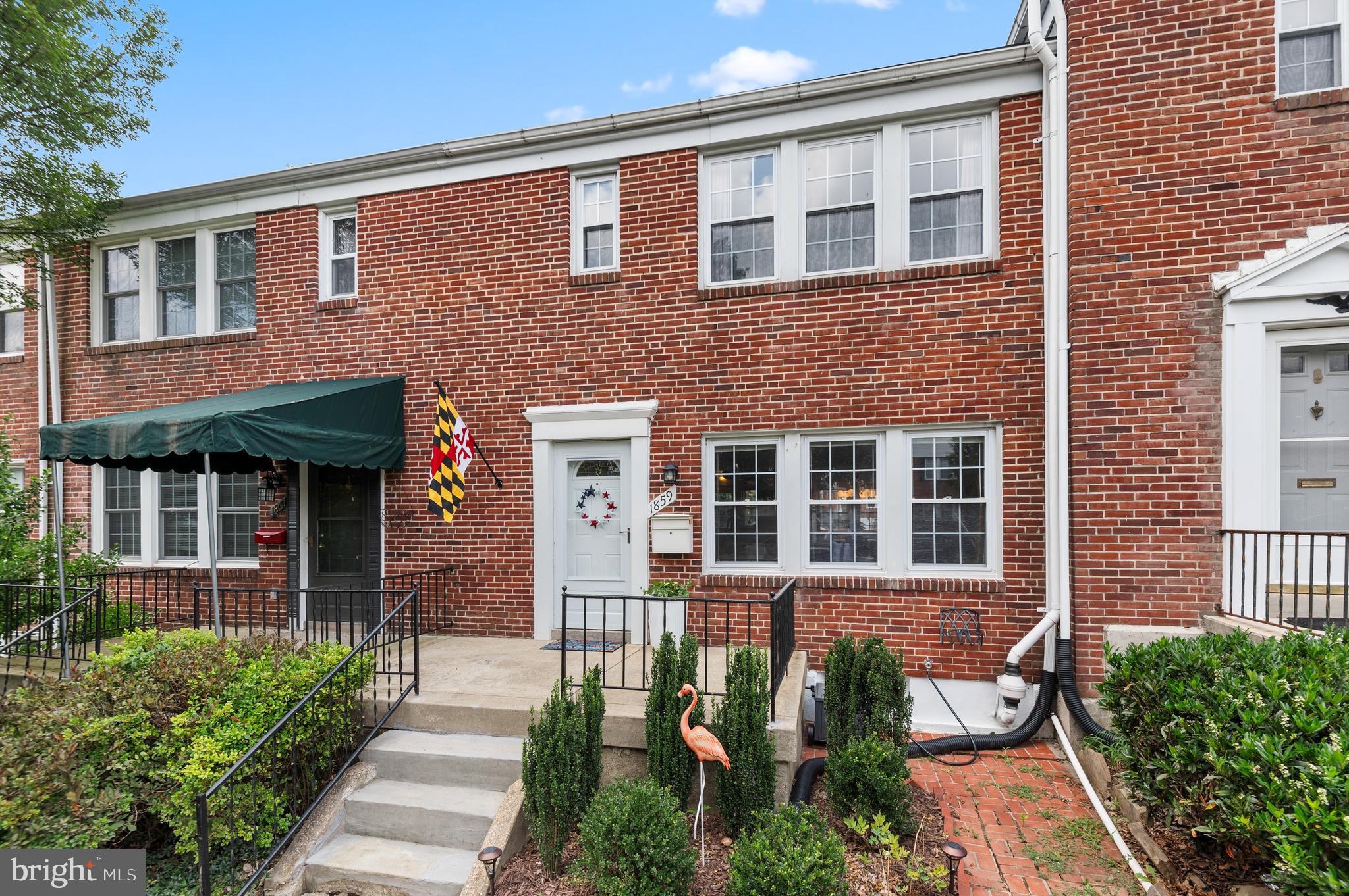 ** OPEN HOUSE - SATURDAY JULY 26, 10AM TO NOON ** Wow - the best house in Loch Raven Village!! Well-loved porch-front townhouse with updated kitchen, two updated full bathrooms and a new roof (2024). Bright and airy with gorgeous wood floors, original woodwork and wood doors. Large, bright main level with fully updated kitchen that opens to dining room, and a large, open living room. Three bedrooms and a nicely updated bathroom upstairs. A large family room, full bathroom, large storage area and updated laundry on the lower level. The back yard features a huge back deck overlooking your vegetable garden and flower beds and your own (large) private parking pad! Large shed, fully wired with lights and outlets, a work bench and loft space for all of your hobbies! Tons of storage. Minutes to 695, 95, 83, Towson, Hunt Valley and Downtown. Own all of this for less than rent!!