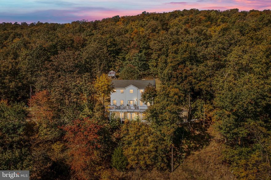 Your search for the perfect home is OVER! This is it! Nestled in the foothills of Bull Run Mountain, this home offers some of the most stunning views Northern Virginia has to offer. Imagine watching the seasons change right from your deck.  With 3 acres of privacy, this home is a nature lover's paradise. Lot next door 2010 Gore Dr also coveys with this home see corner markers for the property line. Don't miss the spectacular views from the fire pit area .  The easy commute (just off Rt. 29) and lack of an HOA are just icing on the cake! Minutes to shopping and I-66.  You will love the gleaming hardwood floors, stainless steel appliances, backsplash, granite counters, and open floor plan to the family room. The master bedroom suite features a wonderful bathroom with custom tile work and oversized soaking tub and walk in shower.  Basement features 10 ft ceilings, walk out, and plenty of storage. Schedule your showing today--this one won't last long!