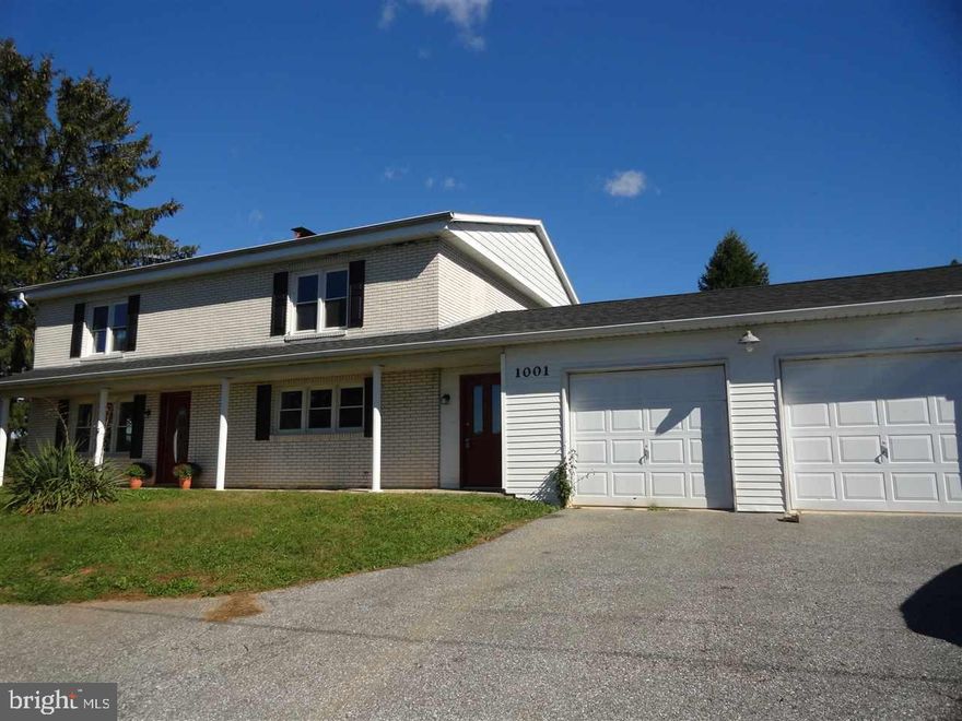 Totally Remodeled 4 BR, 2 Bath Colonial situated on a 1.5 acre lot.  Nothing to do to this home but back up your truck & move in.  New roof, new heating & A/C, freshly painted, hardwood floor, Fireplace, 2 car attached & 2 car detached garages, huge game room and more.  Located in Southern York County.  This home has a great location.