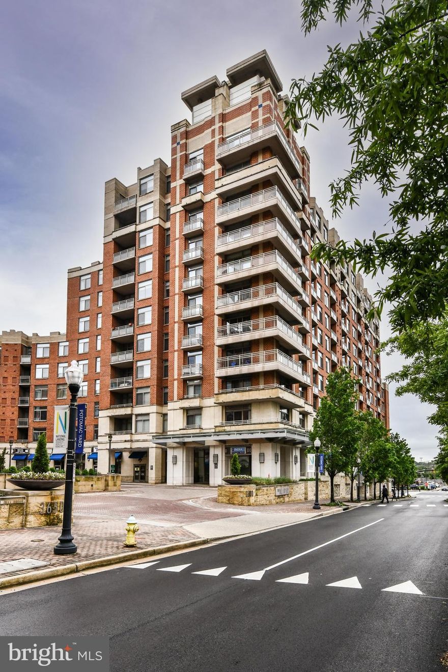 Luxury 2BR, 2BA End Unit condo in The Eclipse on Center Park near Crystal City*Light, bright & Open floorplan*Hardwood floors in kitchen, living room & hallway*Kitchen features ample 42" cabinetry, granite counters & stainless steel appliances*Living room features decorative-only fireplace with mantle, two sets of sliding glass doors leading to balcony & lots of natural sunlight throughout*Primary bedroom features large walk in closet & access to balcony from bedroom*Second bedroom also features access to separate balcony*Updated bathrooms features tiled floors & showers & granite vanities*Washer & Dryer in unit*Home is wired for surround sound*Garage parking - space is conveniently located right by elevator*Quiet courtyard view* Fabulous complex & can walk to New Potomac Yard Metro Station, Virginia Tech. Campus, shopping, restaurants & dining*No Smoking*Concierge & Harris Teeter open 24/7*Within arm's reach of the Pentagon, Old Town Alexandria, Crystal City, Amazon HQ & Reagan National Airport*Bus service right out your door or convenient to the Crystal City metro*