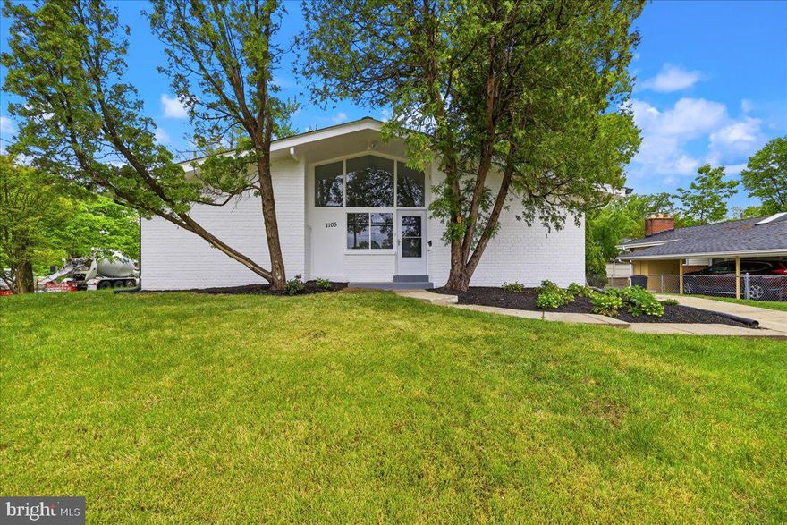 Beautifully updated and truly move-in ready, this stunning contemporary in sought-after Kemp Mill Estates checks every box and then some. With 2,207 square feet of thoughtfully renovated living space, every detail has been done for you.

The open and airy main level draws you in immediately with rich hardwood floors, soaring windows that flood the space with natural light, and a cozy fireplace that anchors the living and dining areas. The fully renovated kitchen is built for real life, with stainless steel appliances, two dishwashers, and ample table space for casual meals or entertaining crowds.

A standout feature is the large private office at the front of the home with its own separate entrance, ideal for working from home, seeing clients, or running a business without sacrificing your living space.

The whole-house generator is a huge bonus for convenience and peace of mind!

Four generously sized bedrooms and three fully renovated full bathrooms, including a stunning double sink configuration, mean there is room for everyone and no one is waiting in line. The fully finished lower level adds even more flexibility, with a bonus room perfect for a recreation space, gym, or guest suite, plus walkout stairs and a separate outside entrance.

Set on a generous 0.18-acre corner lot, the outdoor space offers room to breathe, garden, and play. And the location? Hard to beat, centrally situated right across from shopping with easy access to everything you need.
Homes like this don't last. Come see it before someone else makes it theirs.
