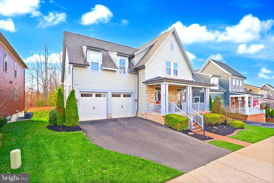 Welcome to 17032 Takeaway Lane — a rare 4,700+ sqft retreat in the award-winning community of Potomac Shores, offering wooded privacy, double outdoor living spaces, and a full custom movie theater you won’t find anywhere else at this price.

Step inside to bright, open living where every detail feels intentional. The main level features a beautiful office with French doors opening to the front porch, a spacious dining room, and a gourmet kitchen with oversized island, gas cooking, and abundant storage. The kitchen flows effortlessly into the living room and the screened-in porch overlooking protected wooded views, creating a true indoor–outdoor lifestyle.

Upstairs, all bedrooms are oversized with walk-in closets, and the primary suite becomes a private escape with a large sitting area, spa-like bathroom, and your own covered balcony for morning coffee or evening unwinding.

The custom home theater sets this property apart, complete with a star-lit ceiling, raised seating, premium acoustic design, and immersive sound. It delivers an experience you simply can’t recreate in most homes.

The finished walkout basement adds even more flexible space with a huge recreation area, full bedroom and bath, and direct access to the backyard and lower patio.

Living in Potomac Shores means resort-style amenities at your doorstep: two pools, a top-tier fitness center, the Jack Nicklaus Signature Golf Course, community events, playgrounds, trails, water access, and the convenience of the new VRE station.

If you’ve been waiting for a home that blends luxury features, incredible space, peaceful surroundings, and a community that truly stands out — this is the one.