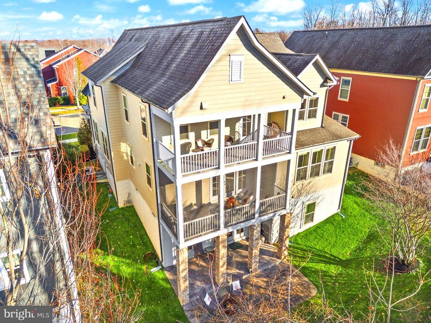 Welcome to 17032 Takeaway Lane — a rare 4,700+ sqft retreat in the award-winning community of Potomac Shores, offering wooded privacy, double outdoor living spaces, and a full custom movie theater you won’t find anywhere else at this price.

Step inside to bright, open living where every detail feels intentional. The main level features a beautiful office with French doors opening to the front porch, a spacious dining room, and a gourmet kitchen with oversized island, gas cooking, and abundant storage. The kitchen flows effortlessly into the living room and the screened-in porch overlooking protected wooded views, creating a true indoor–outdoor lifestyle.

Upstairs, all bedrooms are oversized with walk-in closets, and the primary suite becomes a private escape with a large sitting area, spa-like bathroom, and your own covered balcony for morning coffee or evening unwinding.

The custom home theater sets this property apart, complete with a star-lit ceiling, raised seating, premium acoustic design, and immersive sound. It delivers an experience you simply can’t recreate in most homes.

The finished walkout basement adds even more flexible space with a huge recreation area, full bedroom and bath, and direct access to the backyard and lower patio.

Living in Potomac Shores means resort-style amenities at your doorstep: two pools, a top-tier fitness center, the Jack Nicklaus Signature Golf Course, community events, playgrounds, trails, water access, and the convenience of the new VRE station.

If you’ve been waiting for a home that blends luxury features, incredible space, peaceful surroundings, and a community that truly stands out — this is the one.