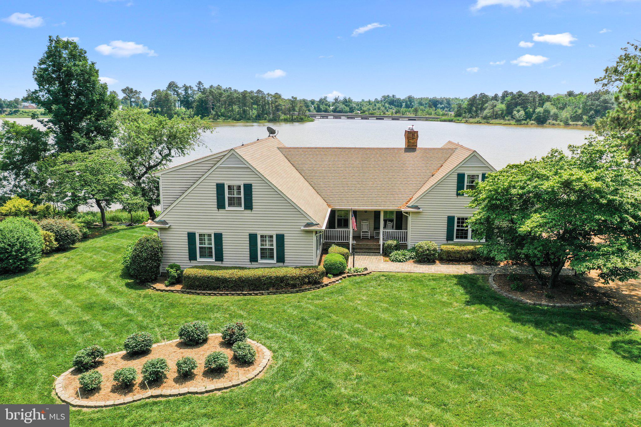 Don't miss this beautiful and well kept four bedroom, three bath home with a 175 feet of water frontage on Mount landing creek and the Rappahannock river. Its home has a sought after main level bedroom and with a full bath right beside it. The main level has large living room , dining room and open family room with gas burning fireplace. This house has a Hugh kitchen that was completely remodeled in 2024. There is a large 30 ft by 12 ft screened in porch off the family room. Upstairs there owner suite and two additional nice side bedrooms. The owner suite open to a large sitting with fireplace and hidden wet bar; also there is access to an enormous bonus room /attic 30 ft by 20 ft. The lot is on a quiet cul de sac with stunning hardscaping, landscaping, pier and dock. This home is just minutes from the town of Tappahannock which has great shops, restaurants, marina VCU Tappahannock hospital and Hobbs Hole Golf course.