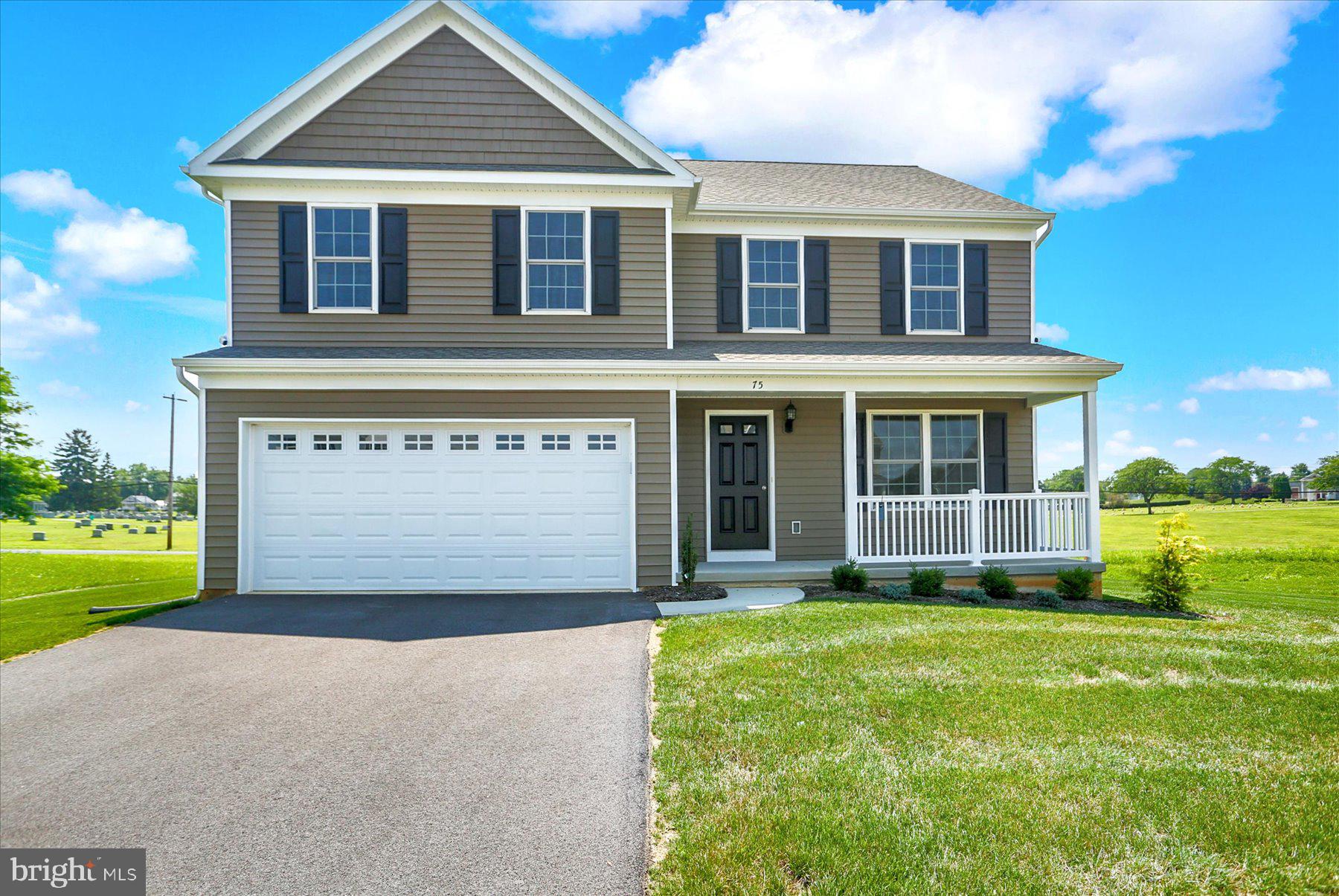 READY NOW! Former model home. Spacious living with four bedrooms, 2.5 baths, and a two car garage. Perfect for your growing family.