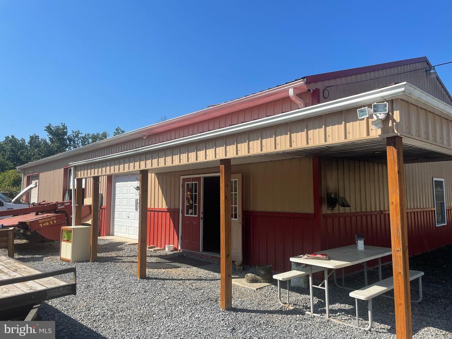 Don't miss your chance to own this unique commercial/residential property with high road visibility.  Located on Route 51 between Inwood and Charles Town, this property features a large 40X80 building with several offices, 2 bathrooms, and a boardroom.  There are 3 auto bays leading to a large shop that could easily be finished to fit the needs of your business.  There is plenty of parking and room to expand.  The 3 bed/2 bath home features recent upgrades including a new roof (2023). The inside is cozy and inviting, and the exterior is perfect for entertaining with a covered patio and beautiful landscaping.   All of this sits on just over 3 acres in a growing area of Berkeley County.   Live in the house and run your business, or rent out the house and shop....Possibilities are endless. Schedule your showings today! 
*Professional Photos coming soon *