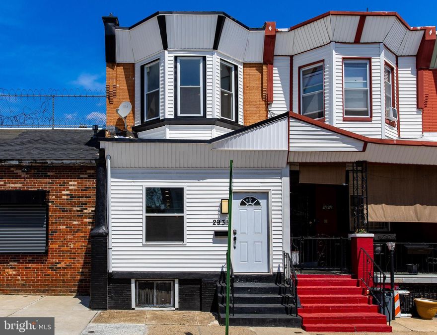 Welcome to 2931 W. Lehigh Avenue — a beautifully remodeled 3-bedroom, 2.5-bath townhome in the heart of Philadelphia! This move-in ready home has been fully renovated from top to bottom, offering peace of mind with all-new electrical, plumbing, roofing, central air, gas heating, water heater, windows, and doors — everything you need for modern, worry-free living. As you arrive, you're welcomed by a charming enclosed front entryway with durable vinyl flooring, perfect for your cozy sitting area. Step inside to a warm and inviting living room featuring vinyl plank flooring, a stylish brick accent wall, and a ceiling fan for year-round comfort. The open layout flows into a dining area with matching vinyl plank flooring, perfect for hosting meals and gatherings. The chef-inspired kitchen is a true standout — showcasing tile flooring, a large island with seating, quartz countertops, stainless steel appliances, and a pot filler over the gas range for added convenience. Completing the main level is a convenient powder room and a dedicated laundry area, offering both style and practicality. Upstairs, you’ll find two well-sized bedrooms with vinyl plank flooring and plenty of natural light. The primary suite features a private en-suite bathroom with elegant tile floors and a luxurious spa shower with a stone floor — your personal retreat after a long day. The lower level includes a partially finished basement — perfect for a rec room, home gym, or office — along with two unfinished storage areas and a utility room. Enjoy being just blocks from Fairmount Park, offering outdoor recreation right in your backyard, and take advantage of easy access to I-76, making your commute smooth and convenient. With quality updates throughout and a prime location, 2931 W. Lehigh Avenue offers the perfect combination of style, comfort, and city convenience. Don’t miss your opportunity to call this stunning home your own — schedule your showing today!