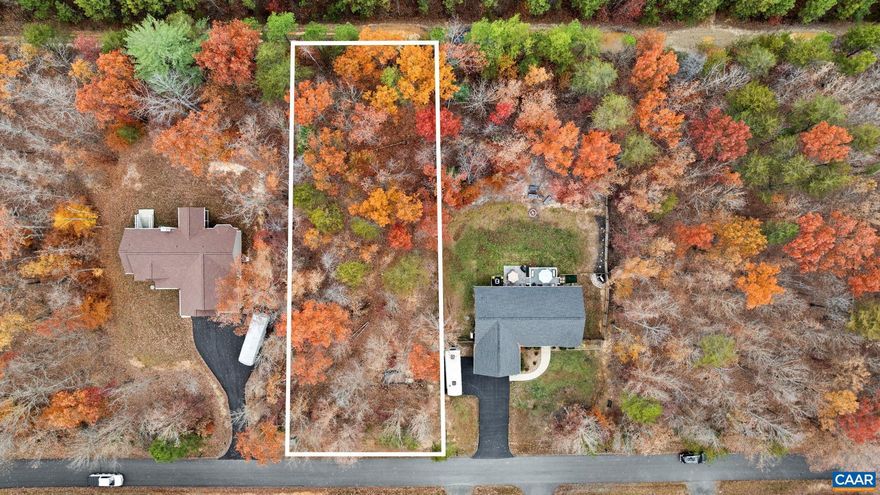 Create your ideal escape within the sought-after Shenandoah Crossing community on this 1/2 acre nearly flat wooded lot ready for your builder. This attractive vacant lot offers a rare combination of natural privacy and access to resort-style amenities, all within a secure, gated lake neighborhood. Residents enjoy use of the clubhouse, swimming pool, tennis courts, walking trails, and scenic lake access, making it easy to embrace an active or relaxed lifestyle.  Tucked into a peaceful setting yet conveniently located near Gordonsville, Lake Anna, Charlottesville, and Richmond, this property is well suited for a primary residence, weekend retreat, or long-term investment opportunity. Don?t miss your chance to own land in one of Louisa County?s most desirable communities. Buyer to verify all information and complete due diligence.  Plenty of privacy and quiet part of the neighborhood.   Public water and sewer.