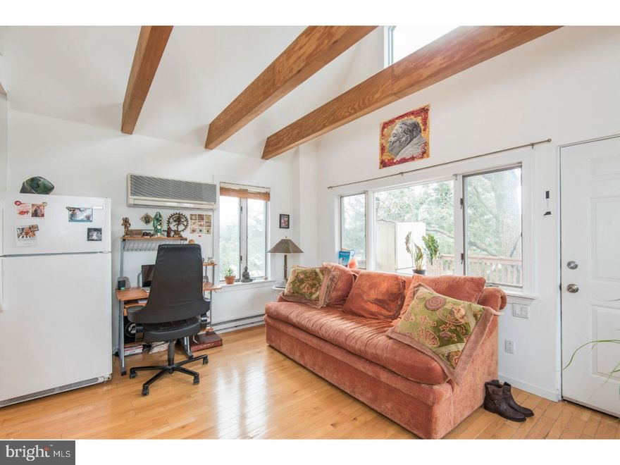 You may have heard people say that unicorns don't exist, but after seeing 212 Elm Terrace, you'll change your mind. Nestled at the end of a quiet cul-de-sac in Narberth, this completely remodeled property is unlike anything you've seen before. Step in the front door and be transported to a peaceful retreat. The current owner has opened up the first floor, creating a dramatic, light-filled space. Off the living room, there is a quiet nook that is the perfect spot to sit with a cup of coffee and enjoy a good book. The gourmet eat-in kitchen features granite counter tops, stainless steel appliances and a breakfast bar, and opens to the sun room. A large skylight bathes this room in natural light, creating the ideal location for an artist's home studio. Upstairs, you'll find the master and guest bedrooms, and a full bath with over-sized jetted soaking tub. Exit the home into the professionally landscaped rear yard, where spring will bloom in the coming weeks, creating an idyllic oasis right at home. Stairs off the back of the house lead to a spacious 1 bed, 1 bath inlaw suite with vaulted beamed ceilings. The owner unit has never been rented and when the second apartment was added, extra insulation installed to secure not only for temperature, but ensure quiet. The apartment also has an in-unit Washer/Dryer. the property has 4 car parking, 2 spaces for each unit. This  1 bed, 1 bath legal apartment can be used for rental income or home based business. Utilities for both units are separate. Located in the award-winning Lower Merion School District, this home is close to shopping and transportation, while feeling like it's a world away. Prepare to fall in love with 212 Elm Terrace!