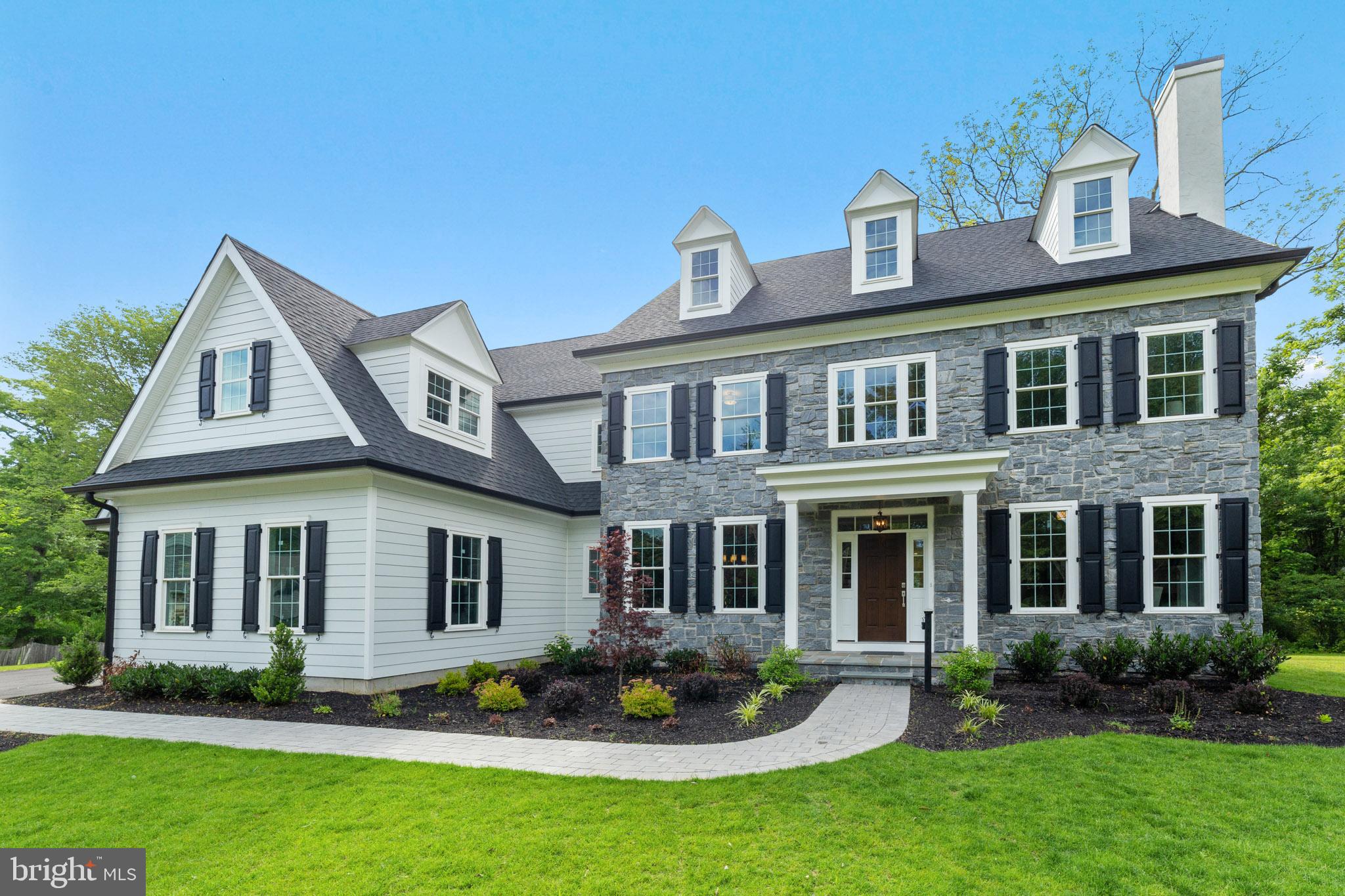 Welcome to 480 Black Swan Lane. Beautiful new construction situated on a level, 1.1-acre lot, overlooking the Sharp's Wood Preserve! A truly special home site on this cul de sac in the heart of Easttown Township. This custom home, designed by McIntyre & Capron, features stone and Hardiplank siding and maintenance free exterior finishes! Take the paver walkway to the covered front porch then enter this spectacular home's center foyer. You'll immediately notice the attention to detail in the millwork, crown molding, and arched openings as well as the site finished red oak hardwood floors that span the entire first floor. On the right, the formal living room with marble surround gas fireplace. On the left, the formal dining room with coffered ceiling and wainscoting. Continue through to the butler's pantry with wet bar, wine refrigerator, beverage refrigerator, and access to the pantry. Next the kitchen with white, shaker style, soft close cabinets for tons of storage, a contrasting center island, Thermador appliance package including double ovens, subway tile backsplash and quartz countertops. The kitchen opens to the bright, spacious morning room which overlooks the Trex deck, backyard and Sharp's Woods Preserve! Adjacent to the morning room is the spectacular great room with vaulted ceilings, a wall of windows that allow exceptional light, continuation of the millwork and a gas fireplace. Just off the center hall is the private den/study and a half bathroom, this could be converted to a first-floor bedroom and a full bathroom. The first floor is complete with a mud room with cubbies, the 2nd powder room, the back staircase to the 2nd floor, and access to the 3-car garage. From the foyer, head up the grand staircase to the second floor, on the left the spacious master suite with double door entry, crown molding & recess lighting, as well as an en suite bathroom with double vanities, large soaking tub, step-in glass surround shower, built-ins, and marble tile floor. The master bedroom has a large his and hers walk-in closets with custom organizers. The remaining 4 bedrooms consist of 2 bedrooms joined by a Jack & Jill with double vanity and tub/shower combination and the remaining 2 bedrooms joined by a Jack & Jill with a double vanity and a walk-in shower. The tile floor laundry room with sink is conveniently located on this level. For those that need more space, there is a walk-up to the 3rd level which could be finished into an additional 1500 square feet of living space. The lower level is also available for future finishing with 9' ceilings and is rough plumbed for a full bathroom and has a 6' egress window. This beautiful new home is located in the Tredyffrin Easttown School District and is within minutes of Route 30 shops, restaurants, and of course the Paoli Train Station! Don't miss the video tour of this spectacular home! Taxes are estimated.