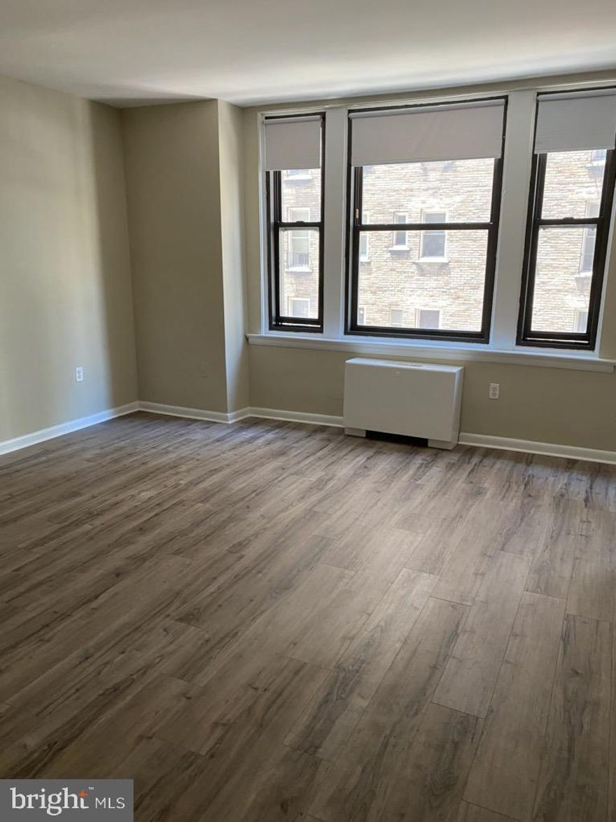 Bright and cheery studio available for rent at The Wellington on Rittenhouse Square! Welcome home to The Wellington, Unit 608- a light-filled studio on Rittenhouse Square. The home features wood-like floors; a generously sized living/dining area with two large wall closets; a well-equipped kitchen with a window; and a full hall bathroom with a single vanity and shower/tub combination. The Wellington is a pre-war apartment building located on Rittenhouse Square offering a 24 hour doorman, on-site management, and access to a nearby fitness center at 1845 Walnut.