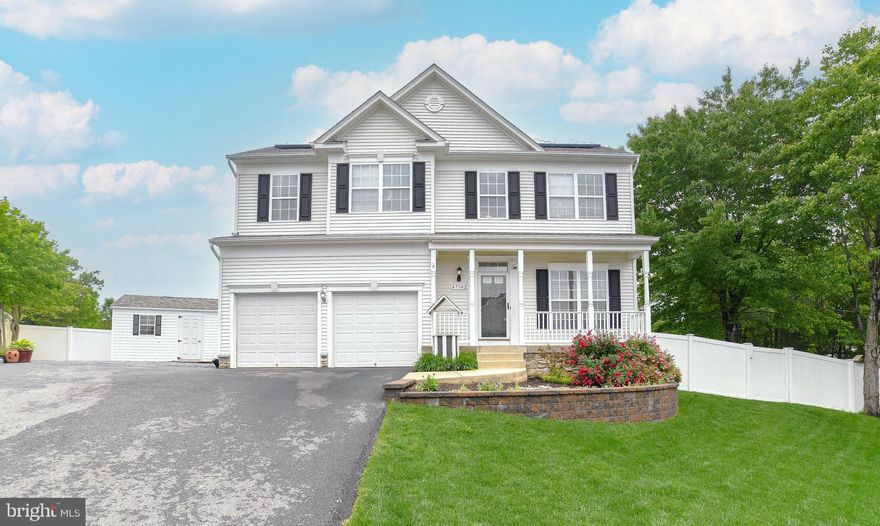 This rental home has been very well maintained and is tucked away on a private lane. Have your morning coffee on the welcoming front porch.  Relax on the deck in the fenced in rear yard.  Home has hardwood floors on the main level, updated kitchen with granite counters, backsplash, stainless steel gas cooktop, hood, wall oven, built-in microwave, and dishwasher.  There are four generous bedrooms upstairs with laminate wood flooring.  Primary bedroom has a large walk-in closet and beautiful attached bathroom with soaking tub and shower.  Finished basement with brand new LVP flooring.  Basement space has a cozy family room, full bath, and a large storage room. Two car garage and back-up generator.  Solar panels!  Enjoy super low electric bills!   Neighborhood has a playground and basketball court.  Great location!  Home is minutes from Patuxent River Naval Air Station, Webster Field, shopping, and dining.