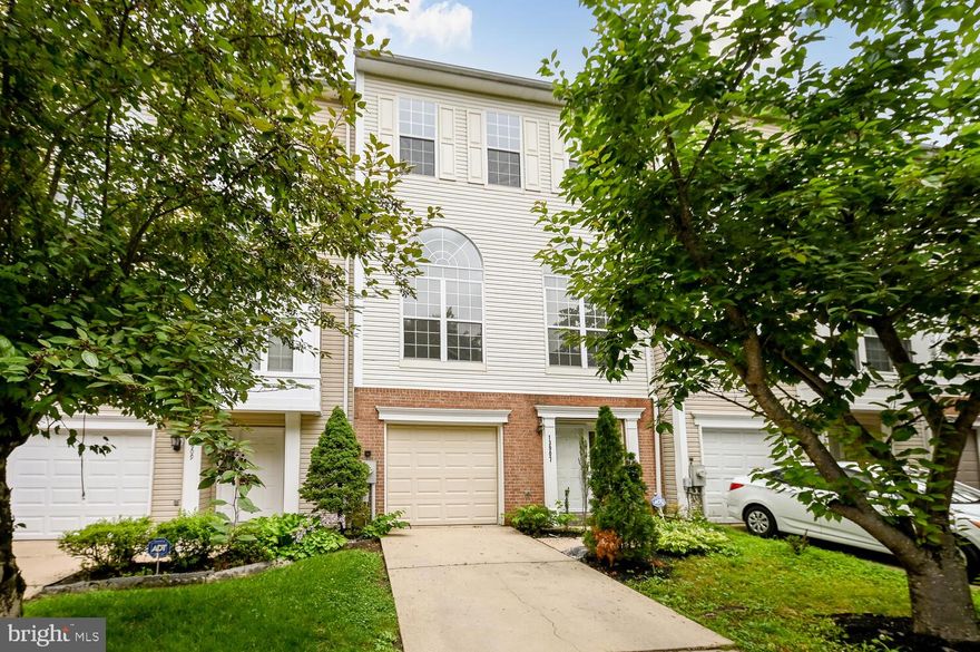 Superbly maintained, modern and large townhouse with attached garage, deck and fenced back yard.  The home has been freshly painted throughout, New laminate flooring on the first and second level and New carpeting throughout the rest of the home.  Stainless Steel appliances gives the kitchen that modern look to go with traditional wood cabinets and granite countertops.  The home has a downstairs bonus room that leads out to a surprisingly large fenced backyard.  The main level has a huge living room/dining room combination with a half bath perfect for when you have guests.  If you do not want to use the dining room space for eating, there is plenty of table space in the eat-in kitchen.  A second set of sliding doors lead you onto the perfect sixed deck that overlooks the serene backyard and a delicate mixture of trees of varying types from maples to oaks to pines.  The laminate flooring spans the entire second level and gives it a very polished appearance.  As you proceed upstairs on the newly carpeted stairways to two large secondary bedrooms, you will notice a two-tiered sunken master with a beautifully designed master bath sanctuary with dual sinks, separate soaking tub and standalone shower.  This home is a great property and located in a wonderful community.