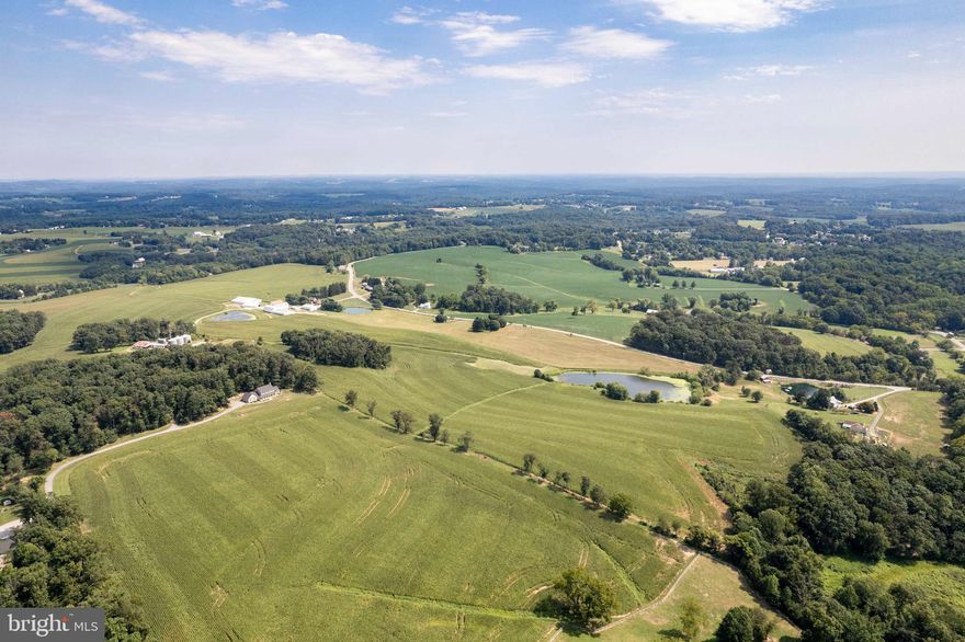 *Rare opportunity to own a working 247acre farm in the heart of Carroll County*Multiple deeds with development subdivision potential*Land is still available to be put into ag preservation*Beautiful 3,500 sq foot colonial with 4 Bedrooms & 2.5 Bathrooms*3 large Ponds*Outbuildings include: Custom 4 bay garage with hvac/bathroom, large bank barn with machine port covering attachment, 4 bay mechanics garage, smaller barn used for storing hay, very large newer pole barn with storage/equipment area, another pole barn currently used for additional equipment, multiple large sheds, a machine shop, silos, & grain drying bin production facility (currently not being used)*Sale tax info tied to this listing includes existing home,  outbuildings, from tax records: 150.9 acres (2200 Fairmount Rd), 6.02 acre Parcel 696 (Fairmount Rd), 20.35 acre Parcel 800 (Fairmount Rd), and 70.525 acre Parcel 689 (Fairmount Rd) totaling 247.8 acres*190 estimated tillable acres*Potential for 14-16 Buildable lots plus existing large home.  Buyer would need to clarify with county and land engineering survey company for any official subdivision plans or permits*