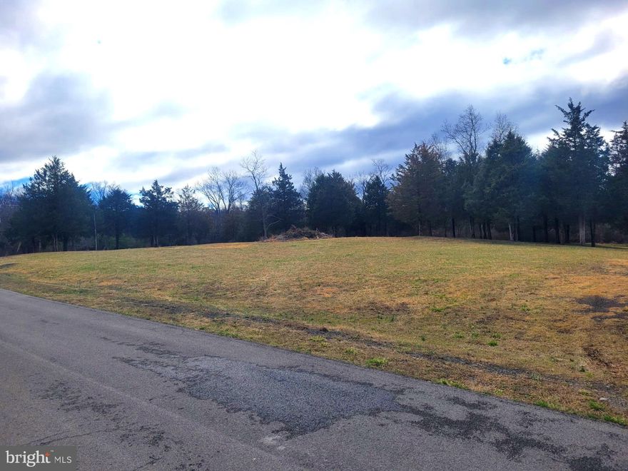 PRIME 2 ACRE  BUILDING LOT, COMPLETELY LEVEL, CLEARED, PAVED ROAD, CITY WATER, READY TO BUILD! THIS LOT IS BEING OFFERED AT AN AFFORDABLE PRICE, NOT TO MENTION THE H.O.A FEE'S ARE CERTAINLY REASONABLE AT $180 ANNUALLY. THAT'S A PRETTY SWEET DEAL FOR A COMMUNITY (KNOWN AS GREENFIELDS) THAT OFFERS CITY WATER, PAVED ROADS, AND BROADBAND INTERNET.  IF YOURE LOOKING FOR THE PERFECT LOT TO BUILD ON, I WOULD CERTAINLY TAKE THE TIME TO CHECK THIS LOT OUT. THIS  PROPERTY IS ABSOLUTELY BEAUTIFUL, LAYS ABOUT AS PERFECT AS YOU CAN GET, HAS AMPLE AMOUNT OF WOODS IN THE BACK AND ONE SIDE FOR PRIVACY. THIS ONE PROBABLY WON'T BE AROUND LONG!