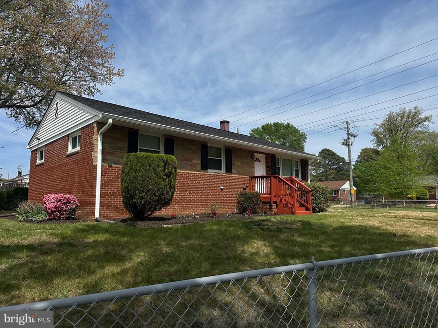 This gorgeous Rambler is a definite MUST SEE!! It has been TOTALLY renovated.  There are 6 Bedrooms and 2 Full Bathrooms.  The Kitchen has new Stainless-Steel appliances; Gorgeous White cabinets and beautiful Counter tops; The Living Room is Open and has pretty Hardwood Floors; Brand New Washer and Dryer are in the Basement; Hardwood floors are also in the upstairs bedrooms. Just off the Kitchen, there's a covered porch perfect for entertaining guests. The yard is fenced in and a new driveway is there for your cars. The Basement level has been totally renovated and is so nicely done. The Roof, Windows, Plumbing, etc. are all brand New. The house is in a great location near shopping, dining, and transportation.  An AMAZING house just waiting for you.  Call for an appointment. Don't miss this one.