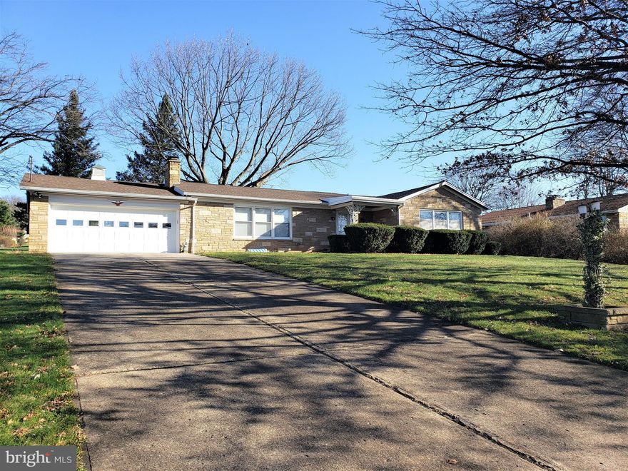 Move in ready home in Frostburg. The home has had some main level walls removed to achieve a more open floor plan and offers hardwood floors and a wood burning fireplace. The main level offers 3 sizeable bedrooms and 2 full baths. The master bedroom has it's own full bath. The lower offers allows space for guests with another bedroom and private bath and useable living space. Tons of storage space.