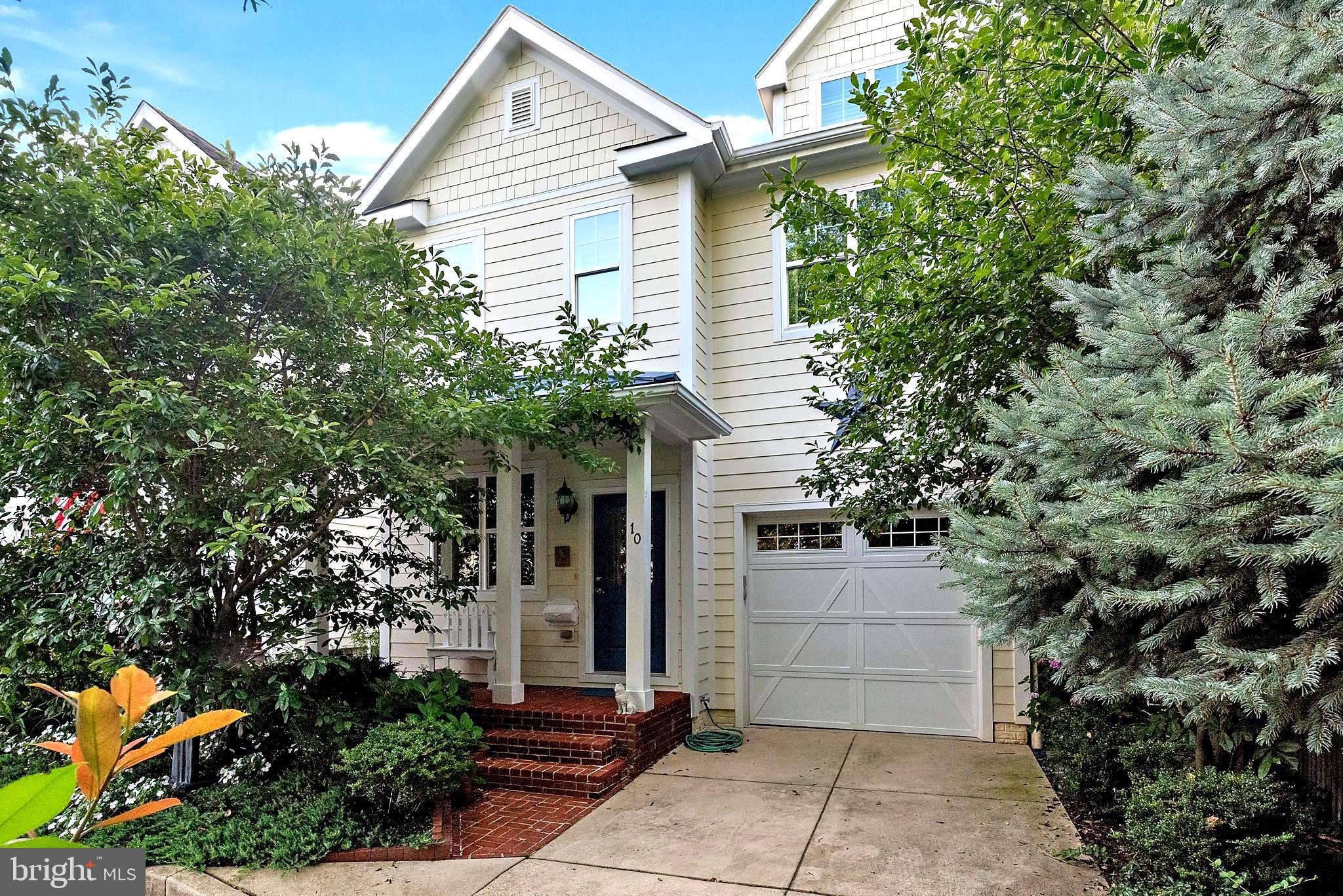 RARE FIND! Private setting in Sailor's Quay in heart of Eastport -- tucked away off main street with lovely plantings in front and a shaded back patio surrounded by trees -- perfect retreat and/or entertaining in style! Brick front porch entry, Hardie-plank exterior, open floor-plan with four levels of flexible space. Custom touches throughout including plantation shutters, wall coverings, crown molding and wainscotting. Main level has hardwood floors, walls of windows for light -- living room with gas fireplace, dining room, powder room and kitchen with atrium door out to a fenced rear yard with circular paver patio and half-wall for extra seating and electric awning....secluded and magical! There is a pretty stone pathway amongst hydrangeas that leads to the front of the house. Upstairs is the primary suite with adjoining bath situated at rear of house and two additional bedrooms with full bath on hallway. Also on the hallway is a large laundry closet currently used for clothing but with washer/dryer hookups intact On the third floor there is a large room (30 x20) which serves as family room and 4th bedroom. The lower level is partially finished into rooms with insulation and an egress window -- workshop with upgraded electricity, storage, utility, office and a half-bath with plumbing to add shower. Additional laundry with washer and dryer is in place here. Two-zoned gas HVAC, 75-gal HWH, garden lighting and sprinkler system on timers. Sailor's Quay community has guest parking off-street on Stevens Alley as an added bonus to their HOA lawn / tree maintenance and snow removal. This is an opportunity to live in-town close to shops, restaurants and all that City Dock / DTA has to offer. Pop over to Vin 909 or Easport Kitchen, Adams Grille, Diehl's Produce, etc in Eastport Shopping Center. So many services nearby to make life easy and spontaneous!