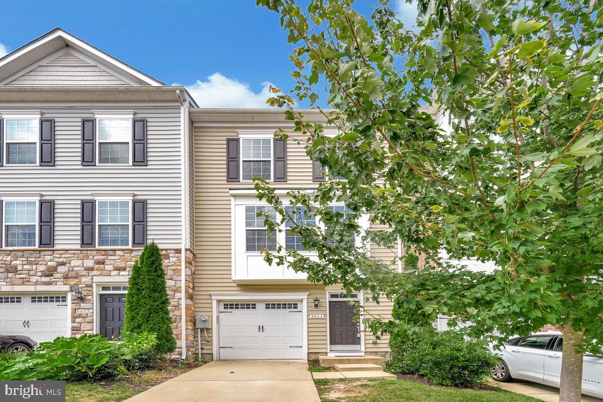 Beautiful townhouse in the desirable Heathermore community with a one-car garage and modern updates throughout. The main level features wood flooring and a bright living room, while the kitchen boasts stainless steel appliances, granite countertops, a center island, and recessed lighting throughout. Upstairs, the owner’s suite offers a walk-in closet and private bath, along with two additional bedrooms and a second full bath. A finished rec room, half bath, and comfortable carpeting on the bedroom level and stairwells complete the home. Recently refreshed with new paint and professionally cleaned carpets. Located near shopping, walking trails, and the community pool, this home is move-in ready and perfect for today’s lifestyle!