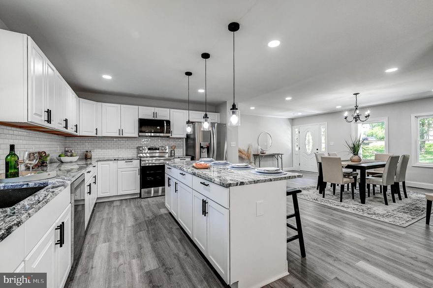 This is the one you've been waiting for! Stunning Brand New Luxury Renovation in Sykesville (21784).... 4 Bedroom, 3 Full Bath Rancher on a .69 of an Acre Lot!  Open Floor Plan that is perfect for Entertaining. Gourmet Kitchen with HUGE Island, Exotic Granite Countertops, Subway Tile Backsplash, Stainless Appliances, Pendant Lighting, etc.... Everything is NEW: Kitchen, Bathrooms, LVP Floors, Paint, Carpet, Windows, Siding, HVAC, Hot Water Heater, Roof, Gutters, Well Equipment, Deck, etc... Dining Area, Big Living Room with Wood burning Fireplace, and Huge Open Kitchen all on the main level. Awesome Primary bathroom, with oversized shower with rain maker like shower head, ceramic tile, decorative tile inserts, with custom seamless glass door. Walk out to a Gigantic Deck a beautiful large rear yard that is perfect for BBQ's, sports, Kid's playing, dogs, etc... Newly Seal Coated Oversized Driveway Offers tons of parking.  Close to everything.... Schools,  Commuter Routes, Grocery Stores, Restaurants, Retail Shopping, Coffee Shops, Gym, and more!