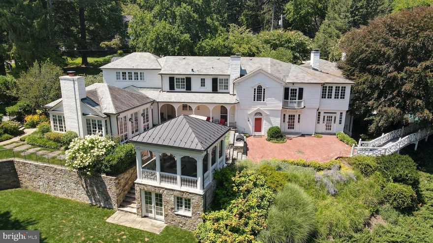 Come view this architecturally pleasing and tastefully updated private residence @ the top of Lhirondelle Club Road w/beautiful views, great light & multiple additions throughout the years. The 1st flr consists of a completely remodeled gourmet eat-in kitchen w/ “Mystery White” marble countertops including a large island w/prep sink; a Miele built-in coffee maker, steam convection oven, microwave & warming oven; a Viking 6 burner gas range, a Sub-Zero refrigerator, generous cabinets & more w/access to a large pantry/staging area w/dishwasher & a Sub-Zero refrigerator---Adjacent to the kitchen is a breakfast area & an awesome family room w/a beamed ceiling, woodburning FP & multiple windows---A 2nd family rm on the 1st level w/a woodburning FP + a fully equipped built-in bar w/a kegerator, 2 refrigerators, icemaker & dishwasher---A spacious Lrm w/bay window and access to a sunroom + a dining rm w/built-in china cabinets---Two powder rms & a pool bath w/sauna round out the 1st level---The 2nd flr is currently configured w/4 brms & 4 full baths including a large Primary bedroom suite w/2 full baths, a separate dressing rm (Could easily be converted back to a 5th brm) + access to both a home office and a laundry/fitness room---The exterior of this home is professionally landscaped and is ideal for entertaining with multiple brick patios, a private inground pool w/a flagstone patio, a separate screened in porch w/a vaulted ceiling, a gazebo w/hot tub & a built-in Lynx gas grill---The sellers spared no expense in the creation of a spacious level play yard out of the hillside w/attractive stone retaining walls---There are 2 driveways on the property that provide EZ access for the owners & guests---For the energy conscious, Geothermal systems have been added which will make a significant difference in your future utility bills.