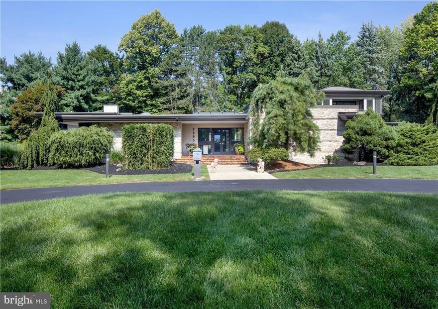 COMING SOON, SHOWINGS START 3/11. 

On more than an acre in a quiet enclave bordering Little Lehigh Creek sits this contemporary mid-century home. Built in 1966 and thoughtfully renovated and expanded, Zen Retreat’s luxurious touches, spacious rooms, and resort-like features add to its essence of sophistication and relaxation.

The unique foyer leads into the atrium, with a stunning Koi pond, plants and curved brick walkway. Well-maintained parquet flooring flows through the first floor and creates a cohesive feel. The open floorplan is an invitation for entertaining family and friends as the music room, sunken living room and dining room create an easy flow to the kitchen while offering tall ceilings, art niches, cherry paneled walls, and dramatic floor-to-ceiling stacked stone fireplaces. The recently renovated bright and airy kitchen features Bosch stainless appliances, quartz countertops, a large island, and Oberholtzer custom cabinetry. Through the kitchen is a den with Japanese-inspired Shoji sliding privacy screens and glass doors that lead to the expansive indoor pool and hot tub. The immersive primary suite features a large walk in closet and opulent bathroom with a water closet and Whirlpool tub. The first floor also features 2 more bedrooms, a craft room, an office, and full bathroom with a hidden shower. The private second level quarters, added in 1995, includes a kitchenette, living room, 2 bedrooms and a full bath.

The desirable neighborhood of custom-built homes enjoys close proximity to the 6.2 mile Little Lehigh Parkway creekside walking trail, major highways, Lehigh Valley Hospital, and prestigious country clubs.