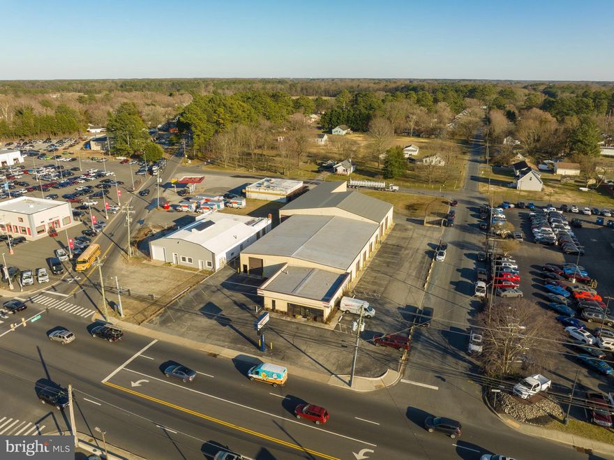 Ideal Retail Opportunity Available! Office/warehouse building situated with frontage on the highly trafficked Route 13 corridor. Other configurations will be considered. The property offers a corner location at the intersection of N Salisbury Blvd and Cherry Way on the north side of Salisbury in the heart of the highly developed retail corridor. The building spans +/- 17,240 SF and sits on 1.23 acres. The former home to Delmarva Autoglass and JG Parks & Sons, offers a new user office/retail space with ample warehouse and multiple points of grade level loading access. There are a total of 9 overhead doors. The retail portion of the building features an open counter/parts area, private offices, and a set of restrooms. The warehouse is divided into multiple sections with overhead door sizes ranging from 12 ft - 14 ft.