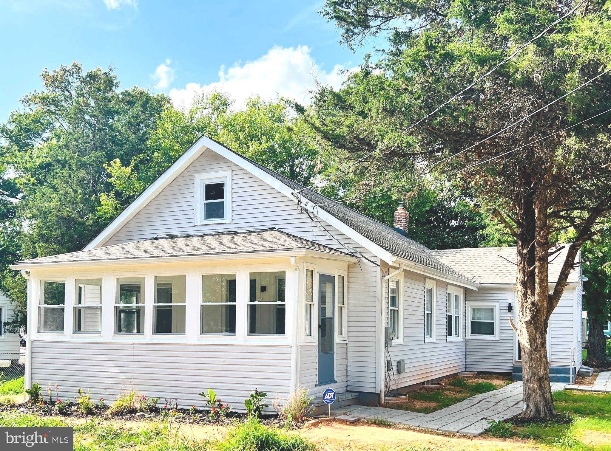 **PRICE IMPROVEMENT** Welcome Home to 5520 Walker Mill Rd! This beautiful, fully renovated property is what you've been waiting for! This gorgeous home sits on a large partially fenced lot with ample space both in the front and backyard, perfect for entertaining or enjoying your coffee under a cool shade—private parking with spaces for up to 5 vehicles. The main level offers an enclosed sunroom to enjoy year-round, a living room with beautiful original hardwood floors, a separate dining room, and a gorgeous renovated kitchen with modern appliances, ample cabinet space, and plenty of natural sunlight. Take the stairs up to a big room with a half bath; this lovely space has endless possibilities! The basement has connecting stairs inside but can also be entered through a private door outside. The lower level offers a bedroom, a full bathroom, a living space, and a brand-new washer and dryer! All this and much more! Location!! This property has a fantastic location within minutes of all major highways, such as I95, I 495, and I 295, three miles to Andrews Air Force Base, 7 miles to National Harbor, 2.5 miles to DC, and 8.5 miles to NoVa. This home offers both tranquility and easy access to everyday amenities. With its charm, functionality, and natural beauty, 5520 Walker Mill Rd presents a rare opportunity for the next owner! Don't miss the chance to make this your new home! Property is secured by ADT! Schedule a showing today